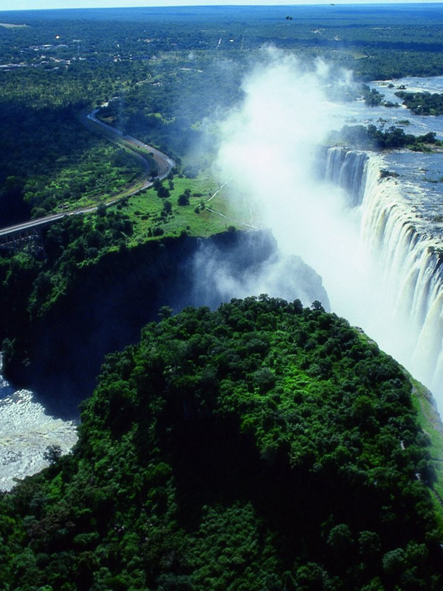 Victoria Falls: One of the world's largest waterfalls, with a width of 1,708 m. 1540x2050 HD Wallpaper.