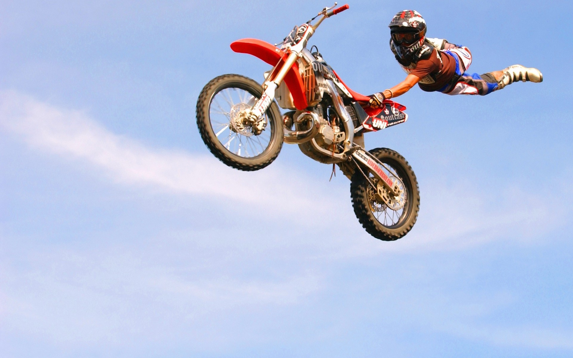 Stunt: Stuntwoman in the air, KTM dirt bike, Aesthetics and a high risk. 1920x1200 HD Wallpaper.