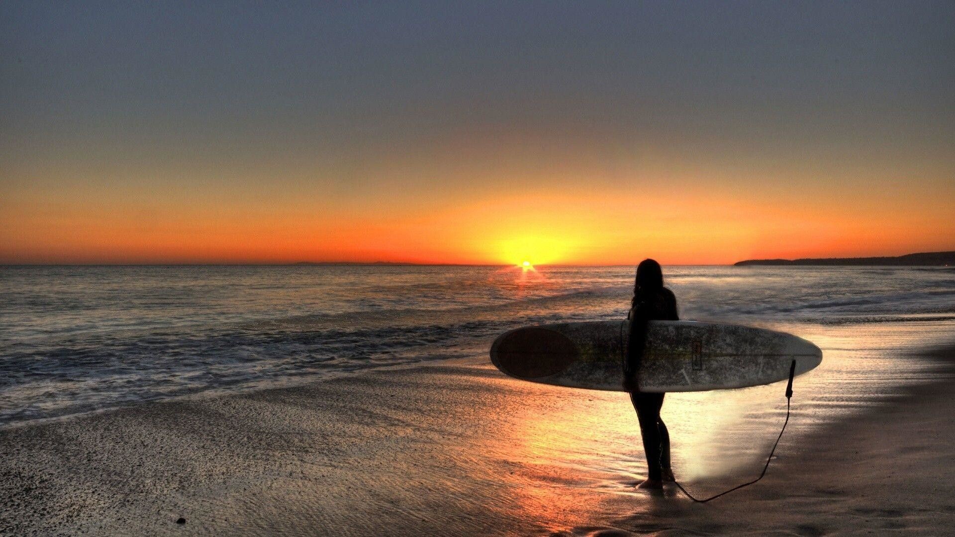 Girl Surfing: Sunset at the beach, Water sports, Costa Rica, Beaches on the Caribbean coast. 1920x1080 Full HD Background.