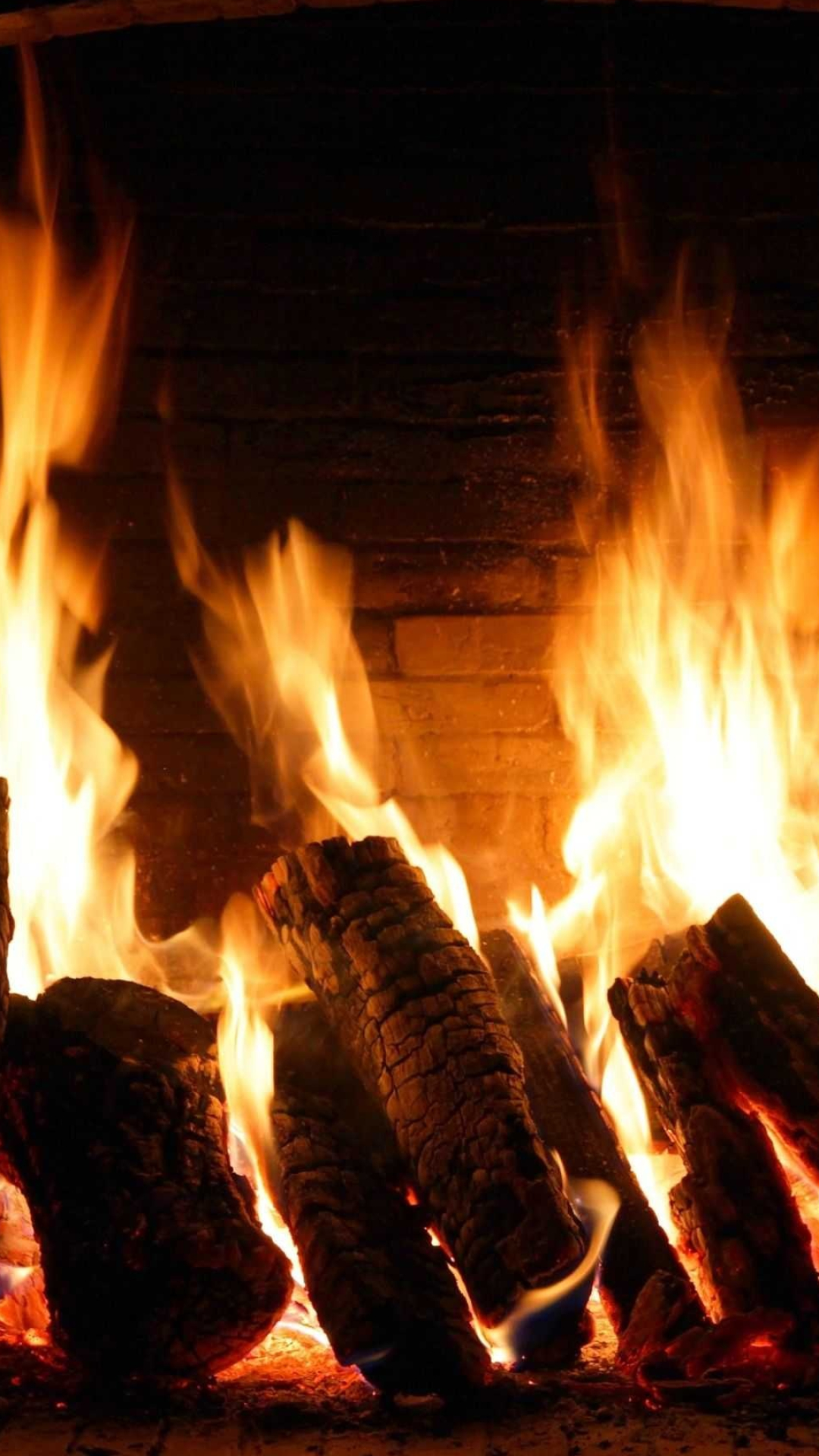Fireplace: Burning logs, Fire, Atmospheric. 1080x1920 Full HD Wallpaper.