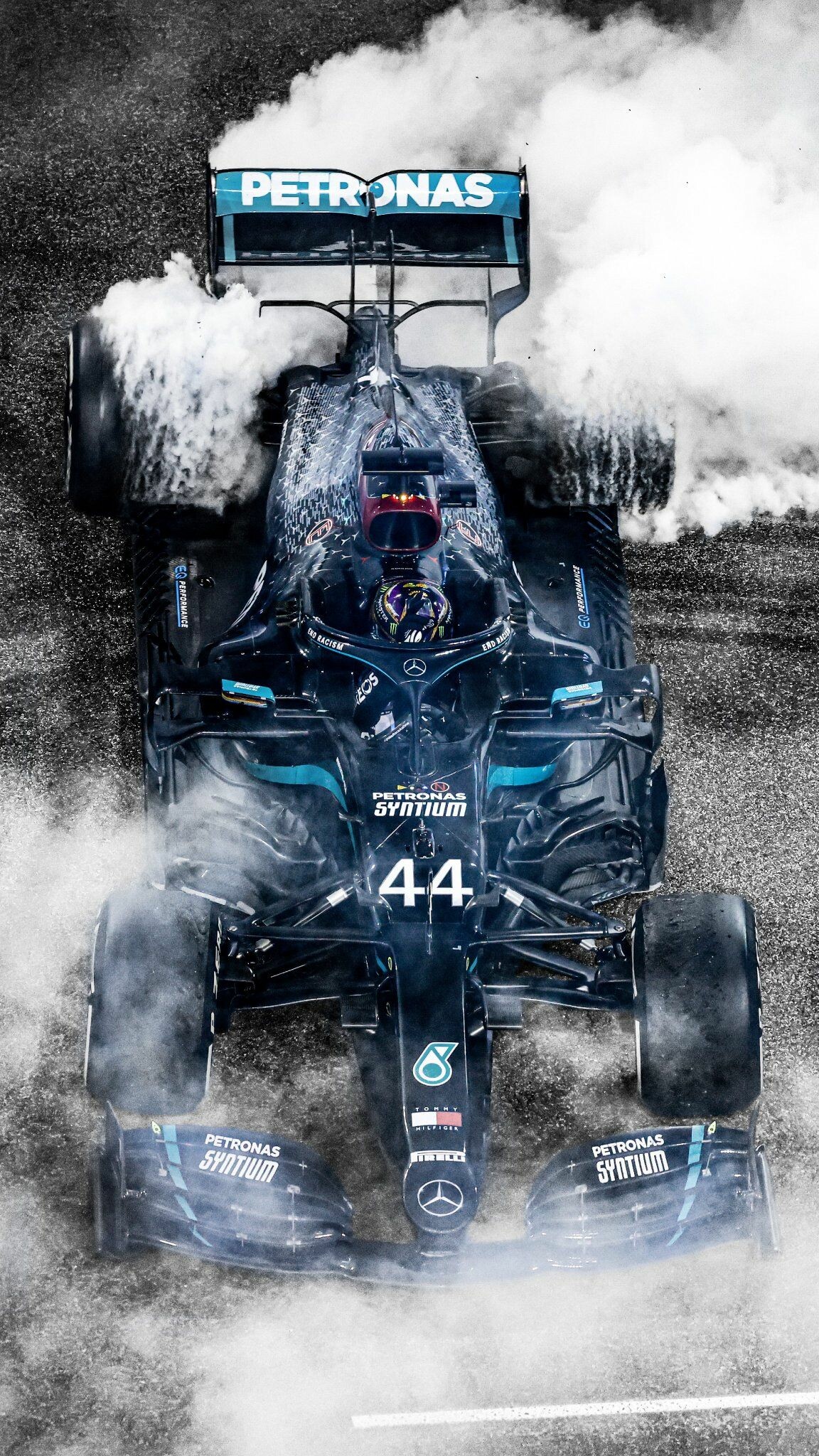 Lewis Hamilton: Signed a contract with Mercedes, replacing the retiring Michael Schumacher, as Nico Rosberg's teammate, 2013. 1160x2050 HD Background.