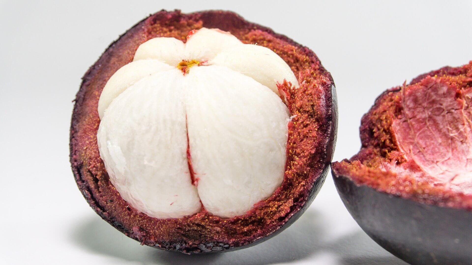 Mangosteen: Used as a natural remedy for digestive issues, skin conditions, and allergies. 1920x1080 Full HD Wallpaper.