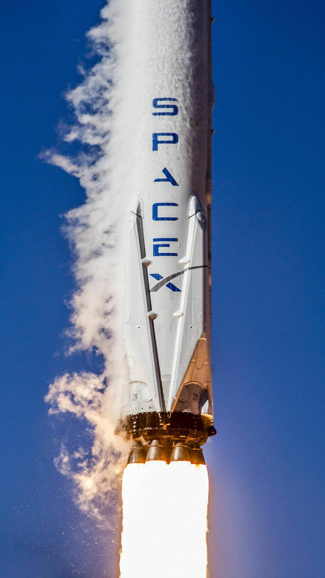 Space Tourism: Falcon 9, a partially reusable two-stage-to-orbit medium-lift launch vehicle, Trip to the stars. 1080x1920 Full HD Background.