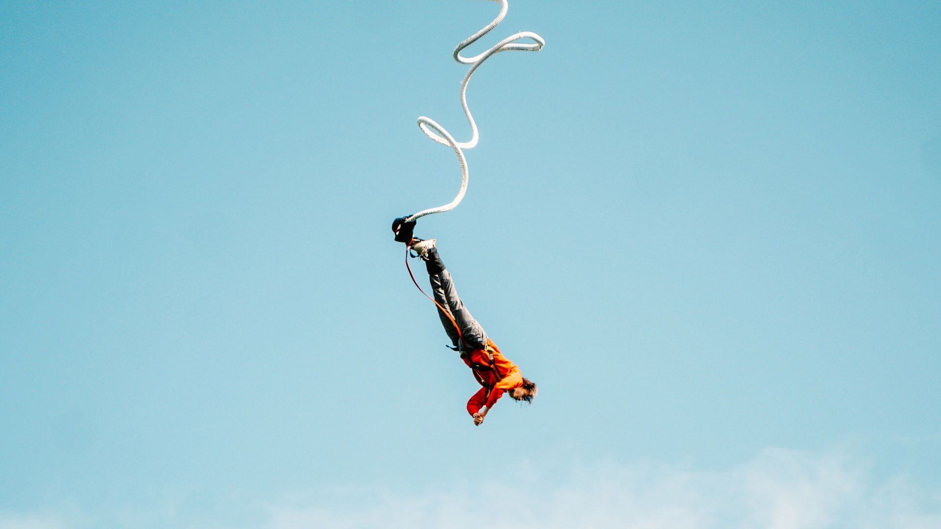 Bungee Jumping: A thrilling free-falling activity in Mountopolis Mayrhofner Bergbahnen resort, Austria. 1920x1080 Full HD Wallpaper.