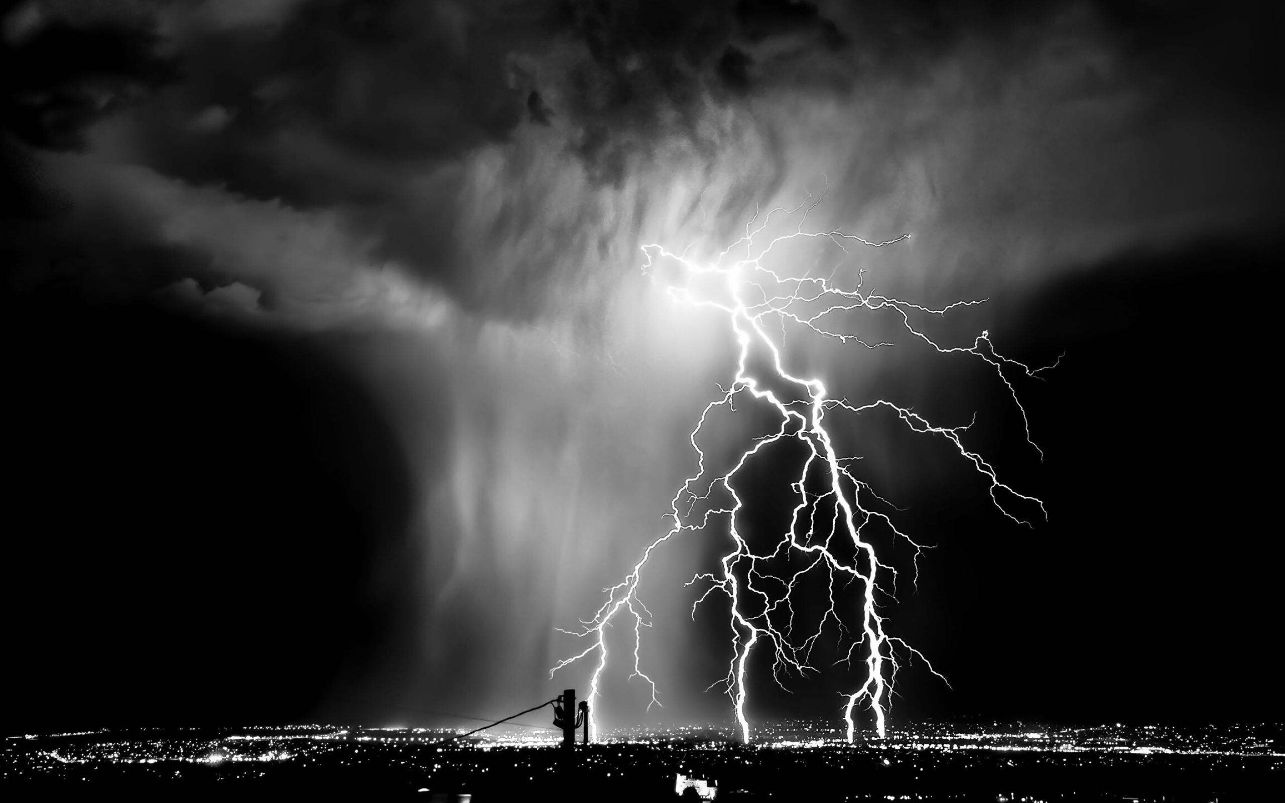 Lightning over the city, Urban electrification, Striking backdrop, Nighttime ambiance, 2560x1600 HD Desktop
