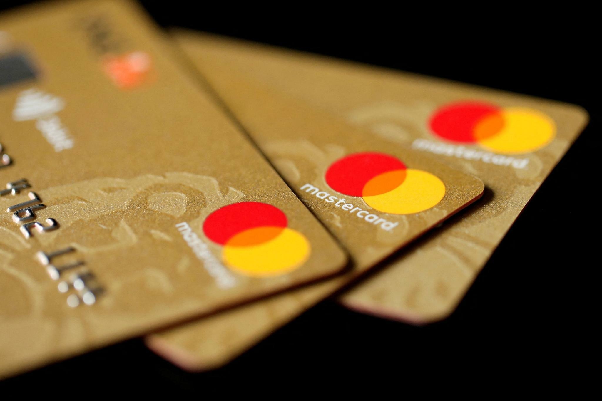 Mastercard: Interlocking red and yellow circles, Symbol, A payment card. 2050x1370 HD Wallpaper.