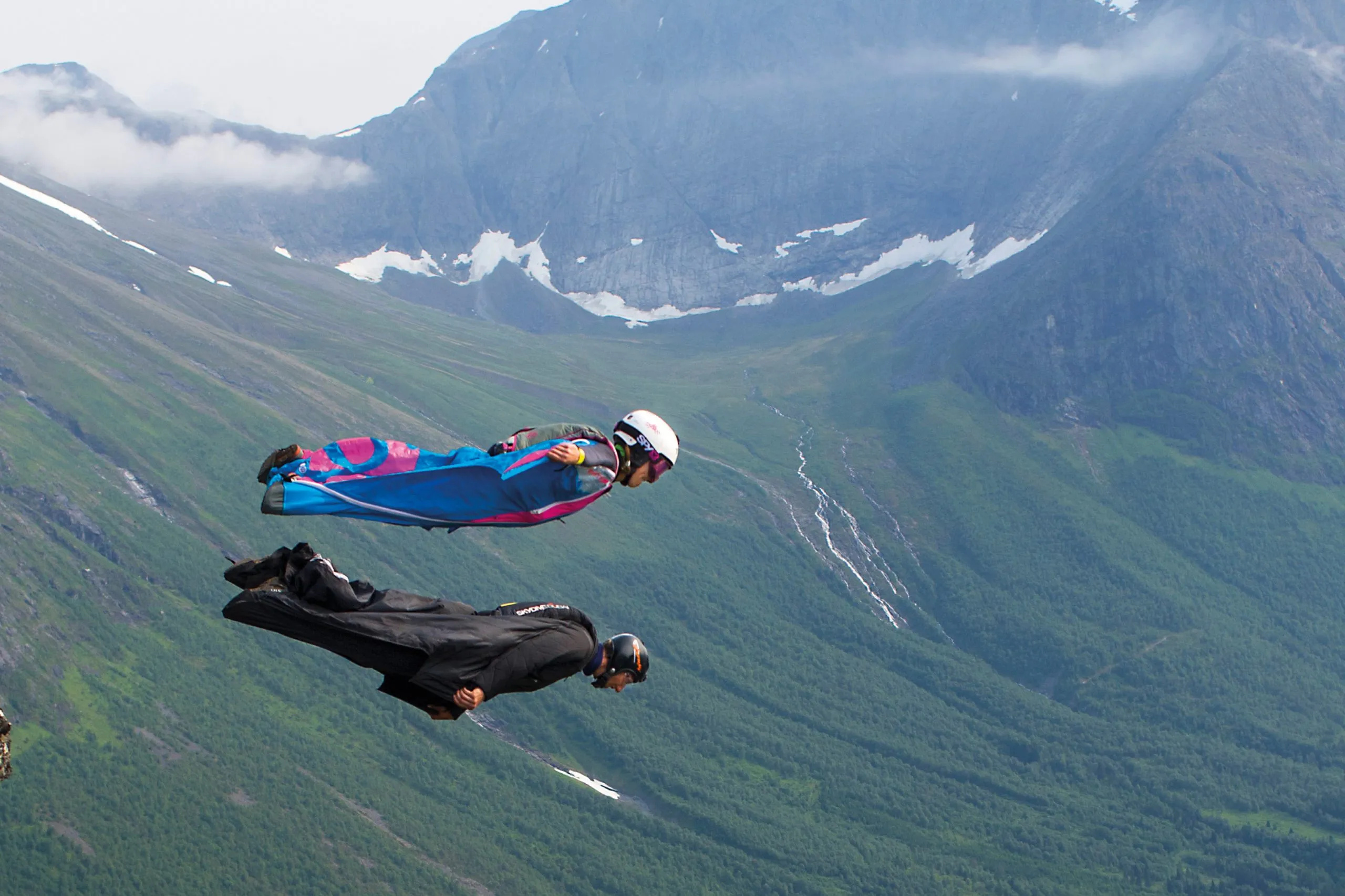Wingsuit Flying: Tandem birdman suits flying in the mountains, Adventure sport. 2560x1710 HD Wallpaper.