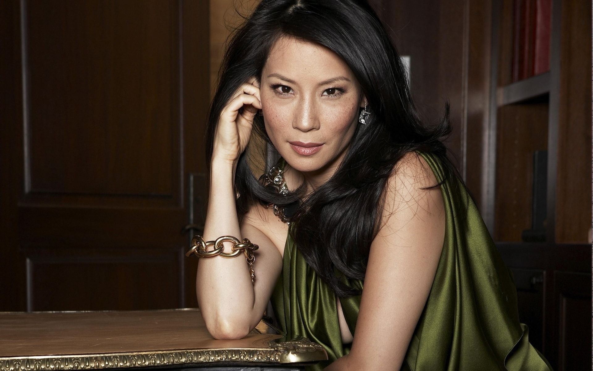Lucy Liu: A TV and film actress known for her work on projects like 'Ally McBeal,' 'Charlie's Angels,' 'Kill Bill'. 1920x1200 HD Background.