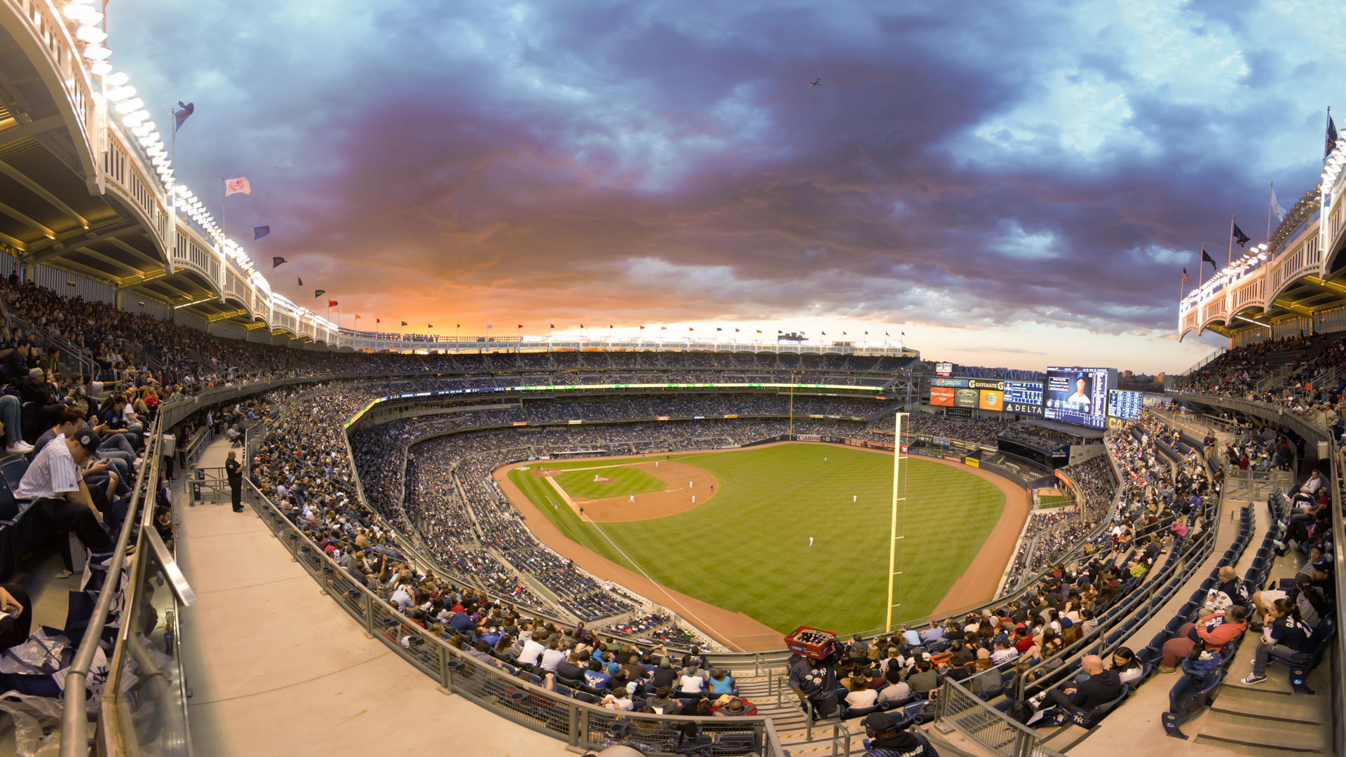 Yankee Stadium, Sunset view, Yankees-Rangers game, LaGuardia flight, NYC skyline, 1920x1080 Full HD Desktop
