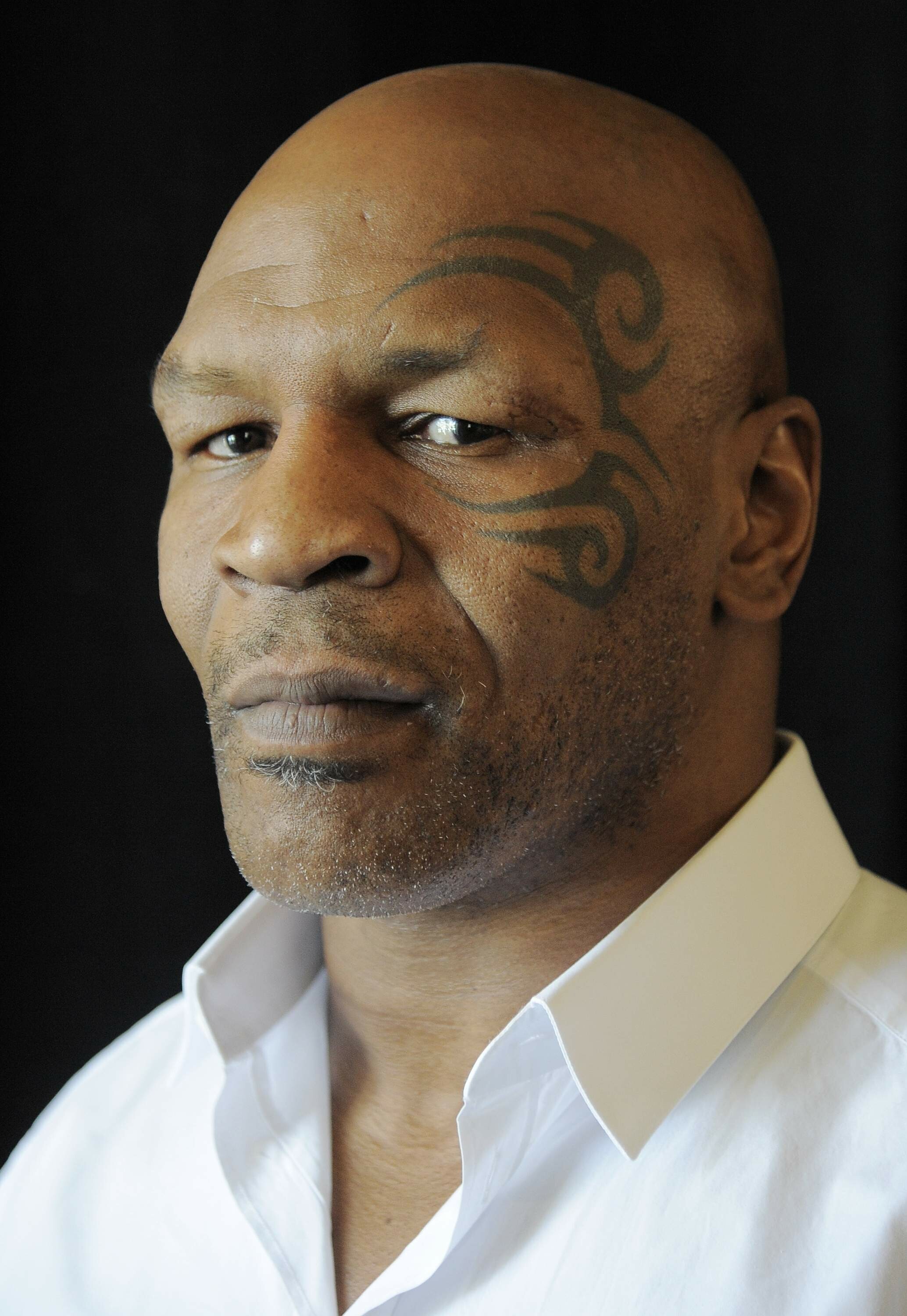 Mike Tyson: He holds the record as the youngest boxer ever to win a heavyweight title. 2070x3000 HD Background.