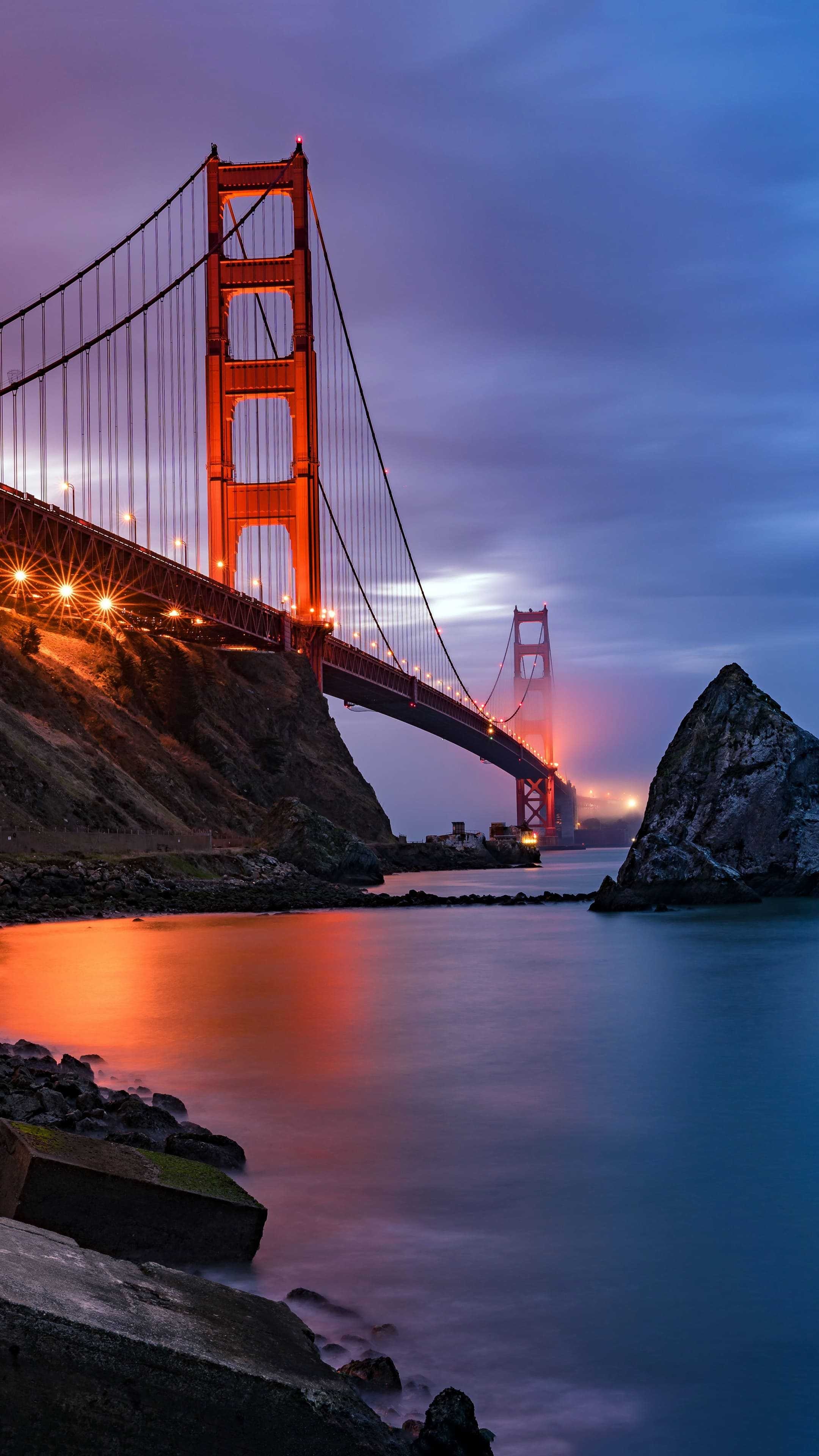 San Francisco: A suspension bridge, The one-mile-wide strait, SF Bay, Pacific Ocean. 2160x3840 4K Background.