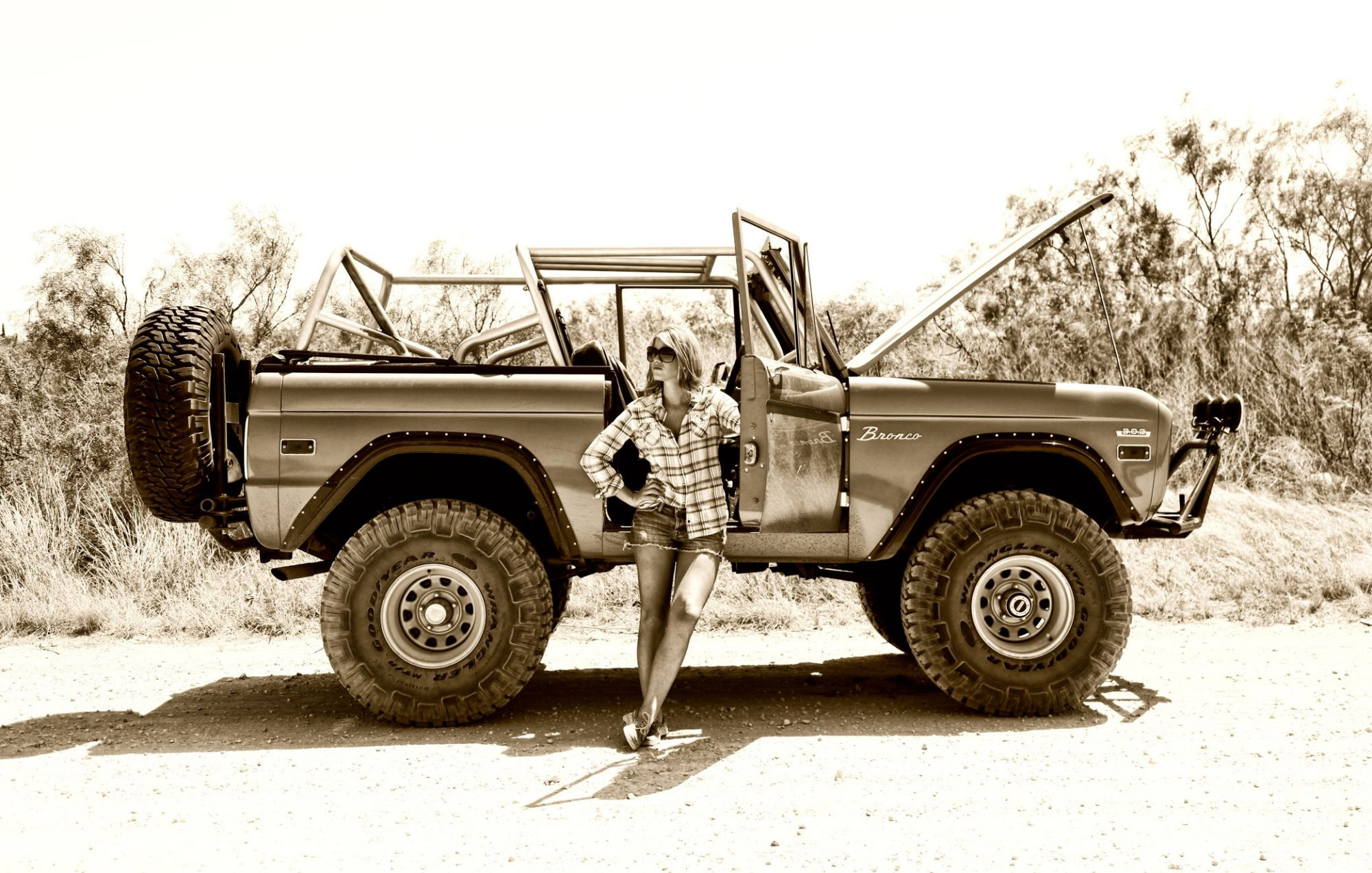 Ford Bronco: Sepia, A Heavy-Duty Suspension, Off-Road Capability, Front-Engine, Four-Wheel-Drive. 2000x1280 HD Wallpaper.