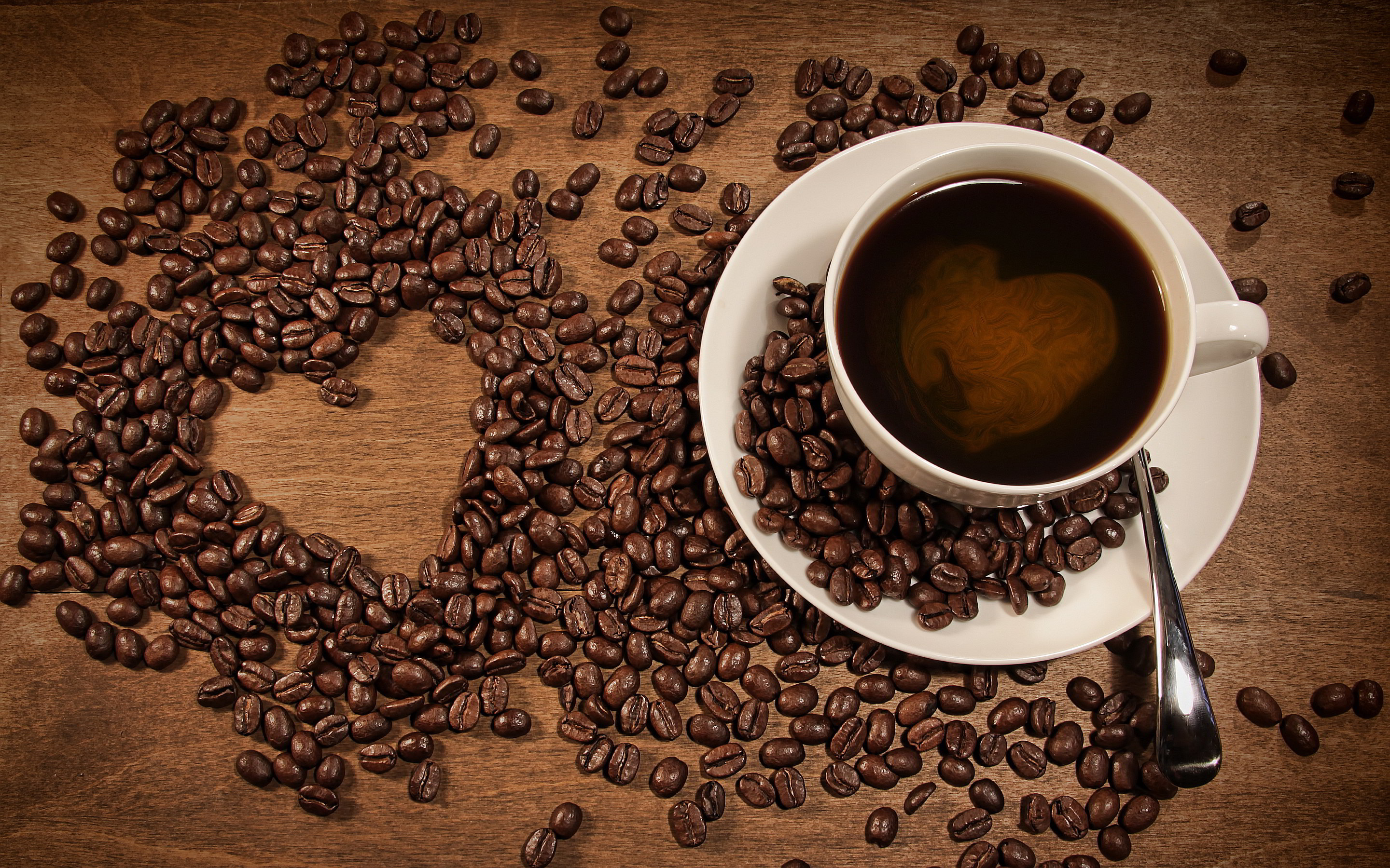 Coffee: The beans are roasted and then ground into fine particles, Arabica. 2880x1800 HD Background.