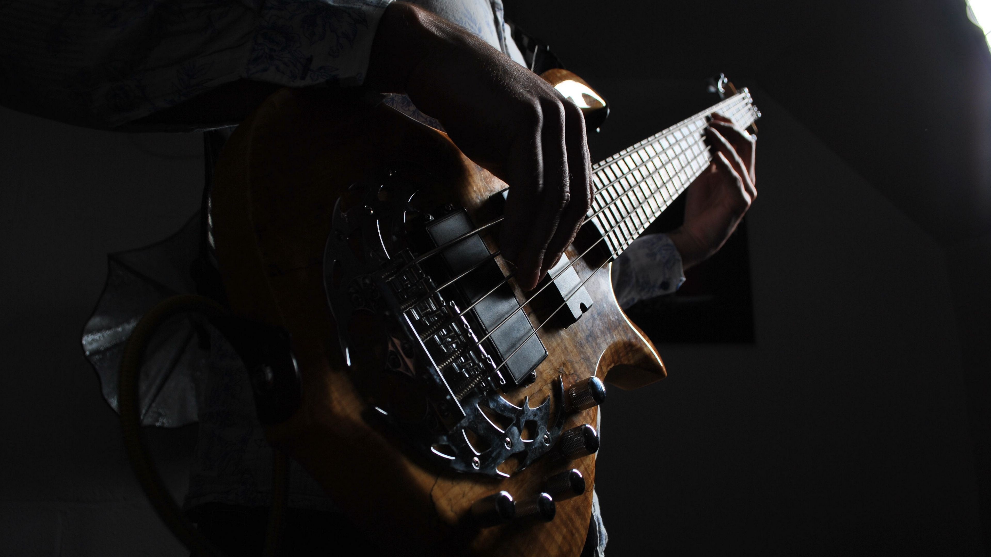 Guitar: Bass-guitar, Musician, Few licks, A flat-bodied stringed instrument with a long fretted neck. 3840x2160 4K Wallpaper.