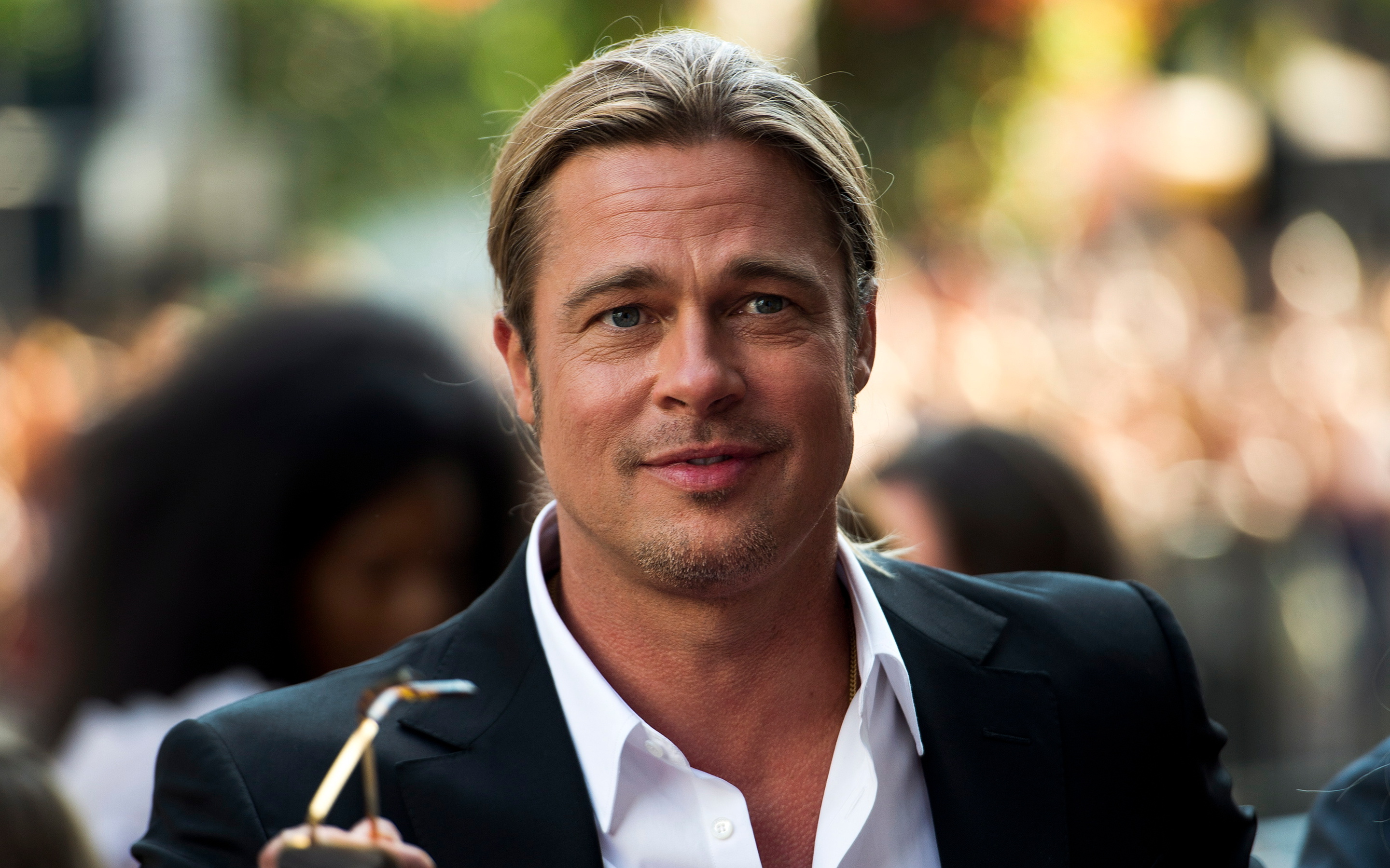 Brad Pitt: Actor and producer, Nominated for multiple awards, headlined major films for over three decades. 2880x1800 HD Background.