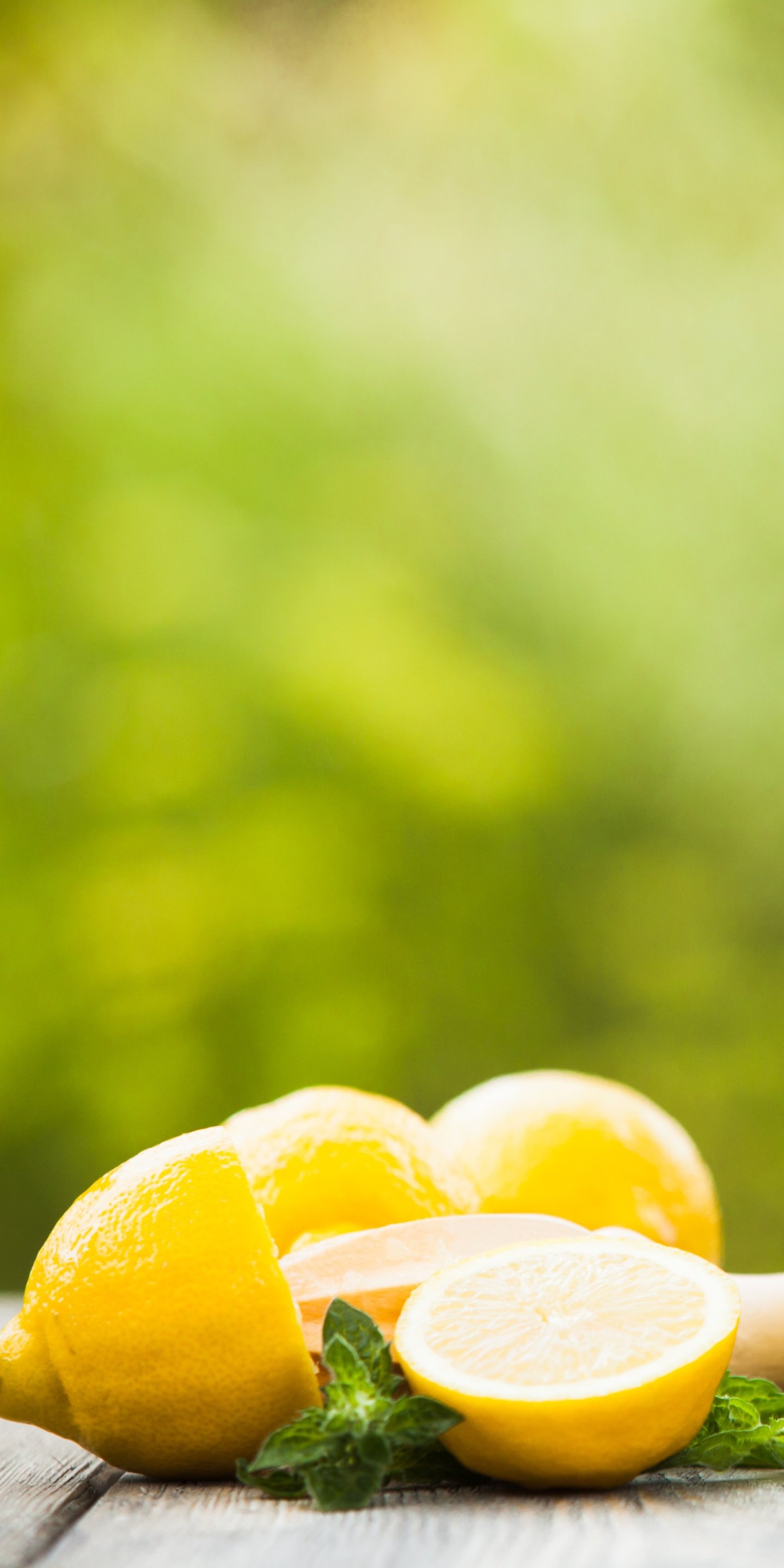 Lemon: Contain numerous phytochemicals, including polyphenols, terpenes, and tannins. 1440x2880 HD Background.