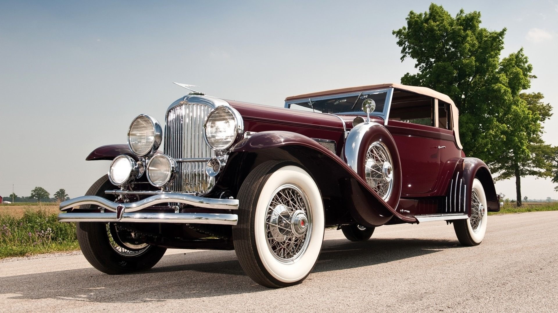 Vintage Car: Innovative technological advancements for the time, Duesenberg. 1920x1080 Full HD Wallpaper.