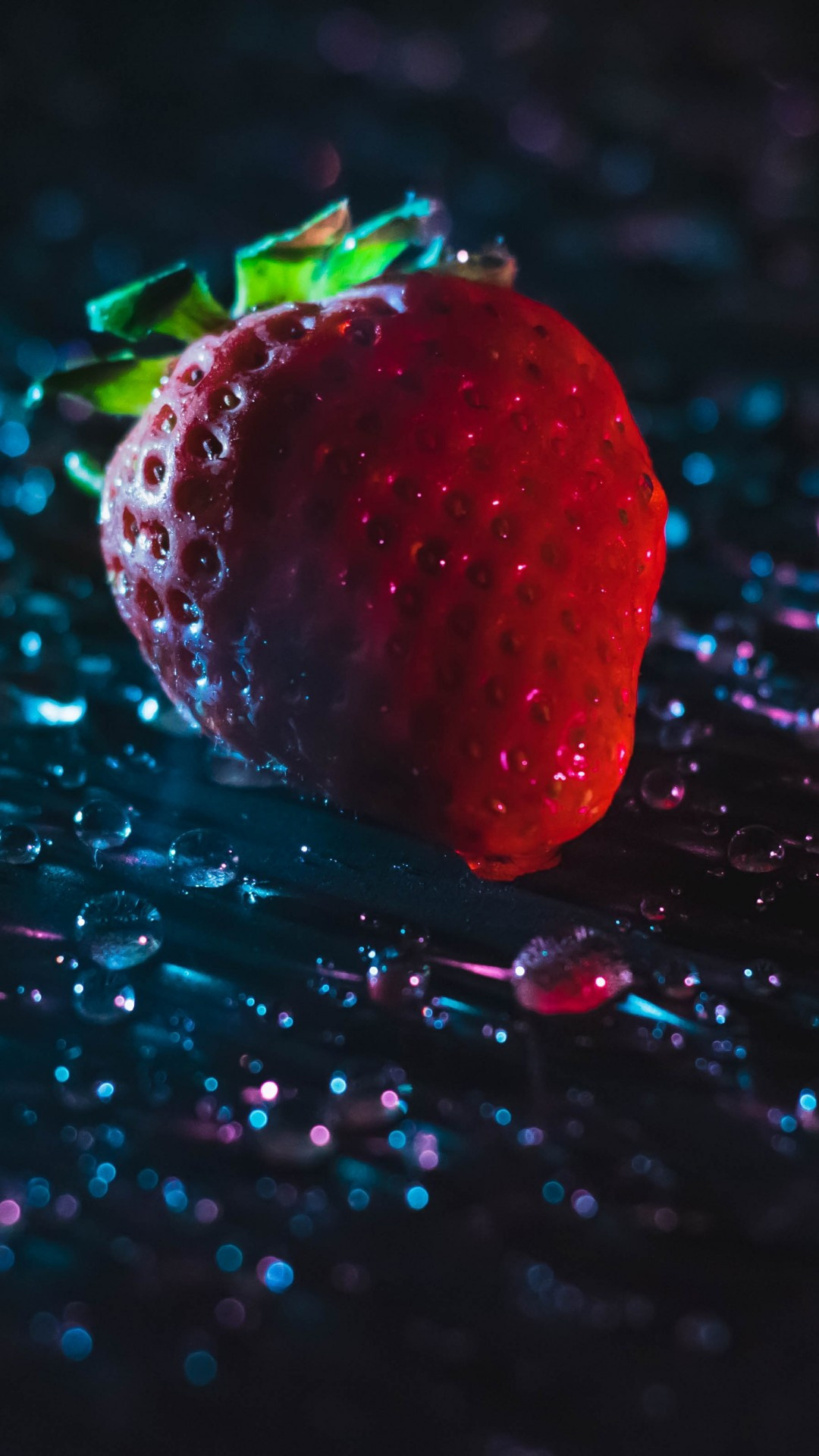 Strawberry: Plants can live and produce fruit for multiple years. 1080x1920 Full HD Background.