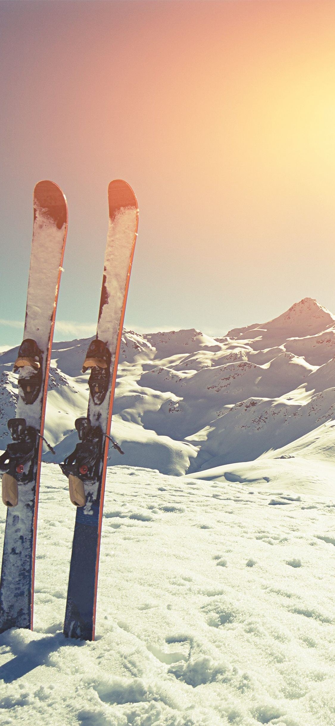 Alpine Skiing: Winter sports equipment, Passing the distance on a snow track, Powder skiing. 1130x2440 HD Background.