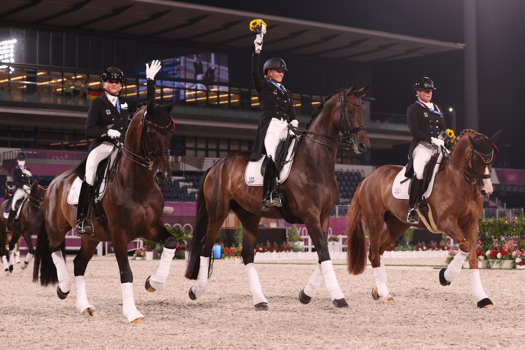 Dressage: Victory parade for winners of the Olympic Games in Tokyo, Von Bredow-Werndl's new Olympic record, Germany's team Dressage gold medal victory parade. 2050x1370 HD Wallpaper.