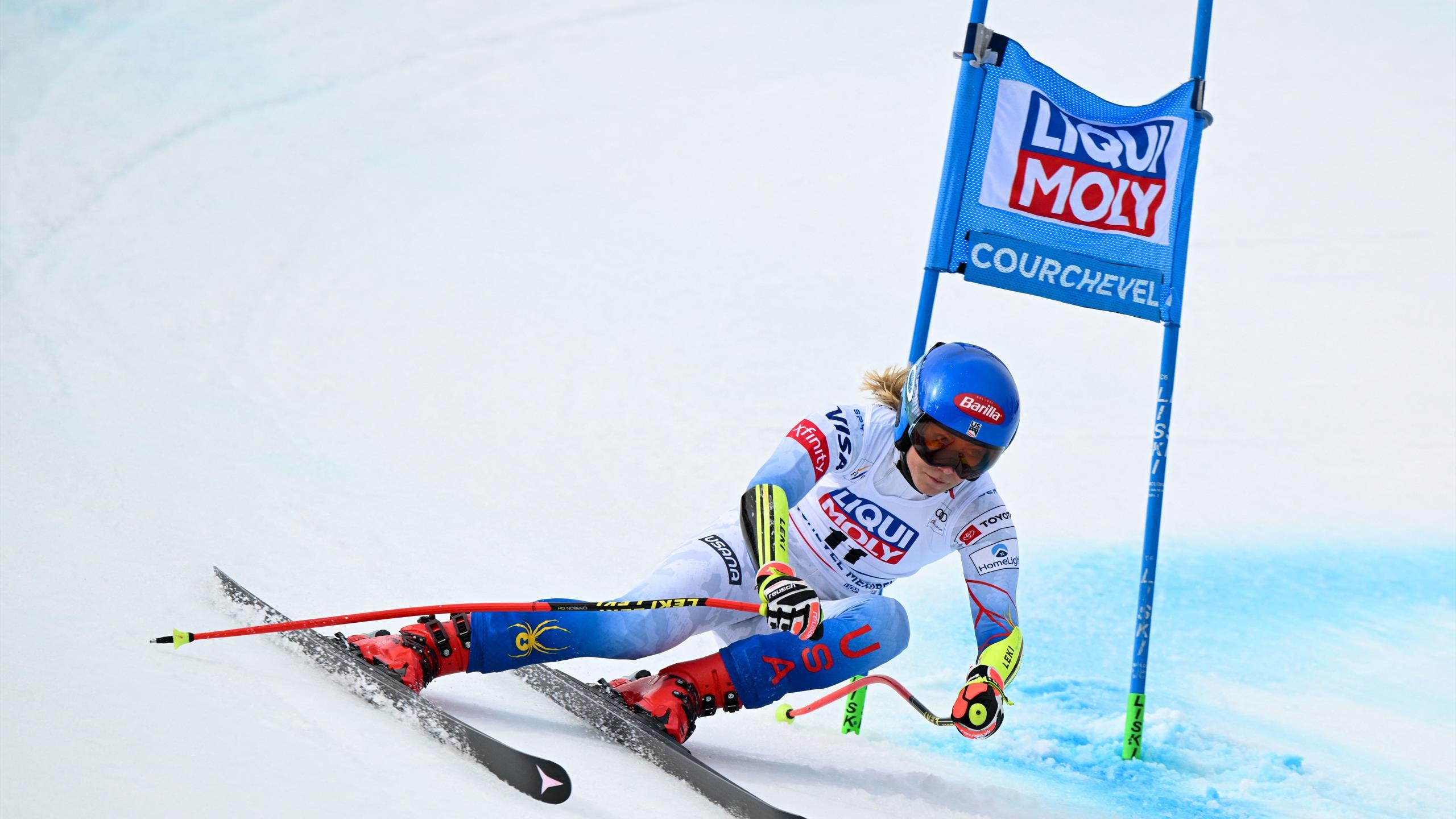 Alpine Skiing: Mikaela Shiffrin, Downhillin a zigzag between upright obstacles, Team USA. 2560x1440 HD Background.