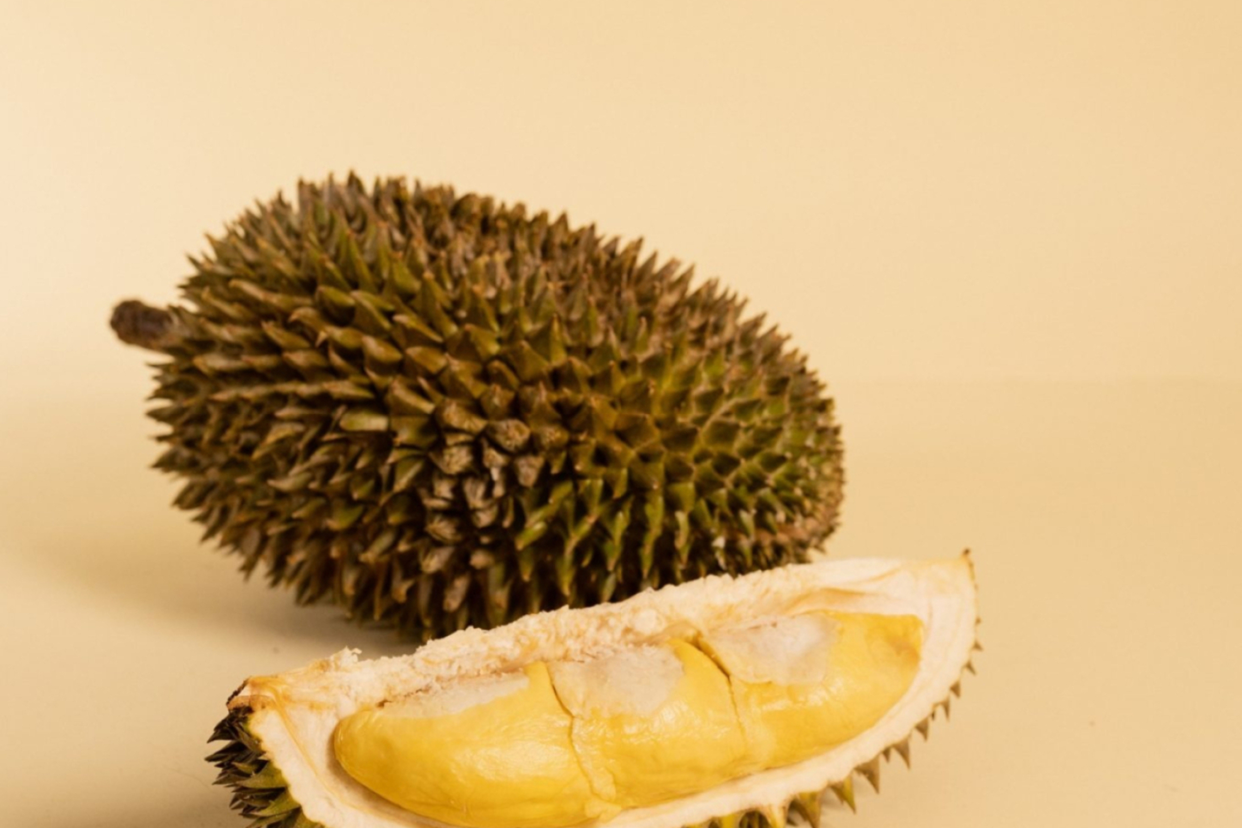 Durian: Used to flavor savory and sweet desserts in Southeast Asian cuisines. 2560x1710 HD Background.
