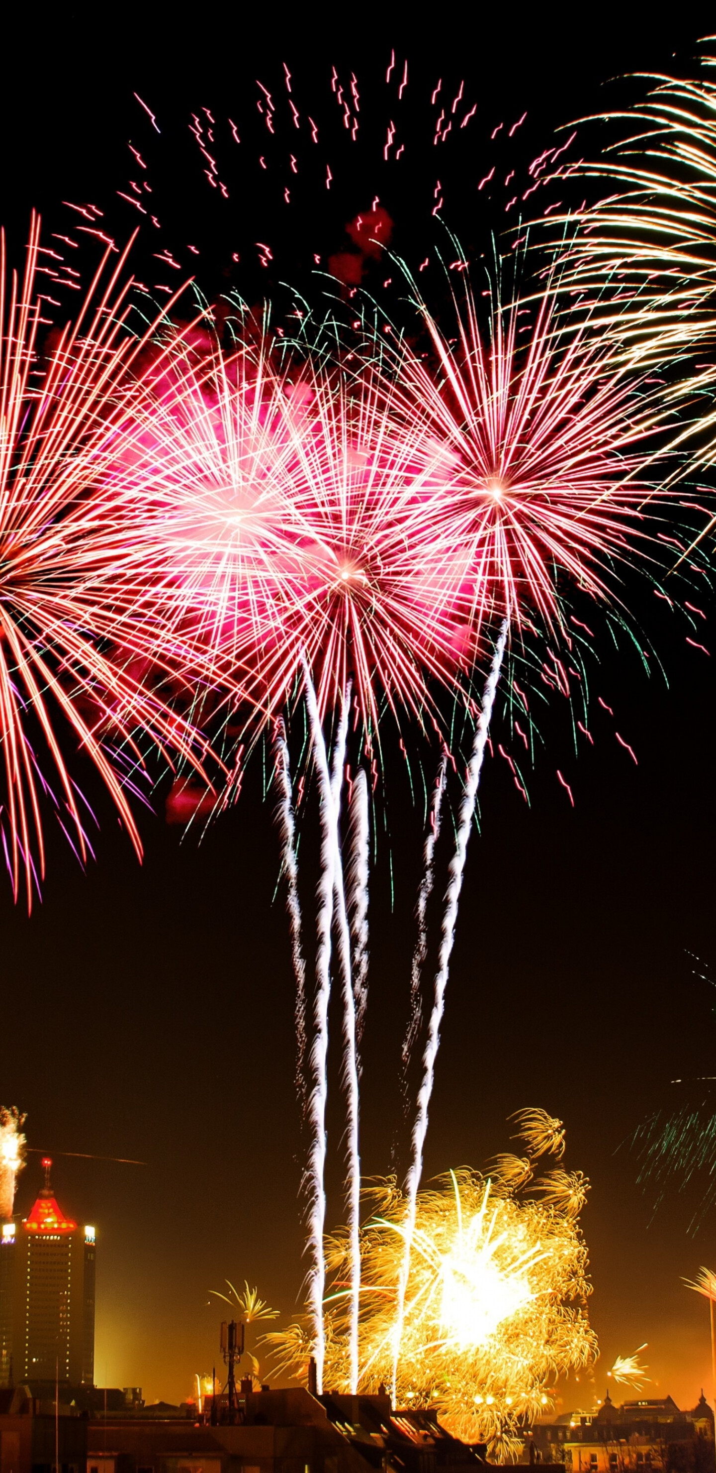 Celebration: New Year's eve, Fireworks, Night, City, Celebrations, Buildings. 1440x2960 HD Background.