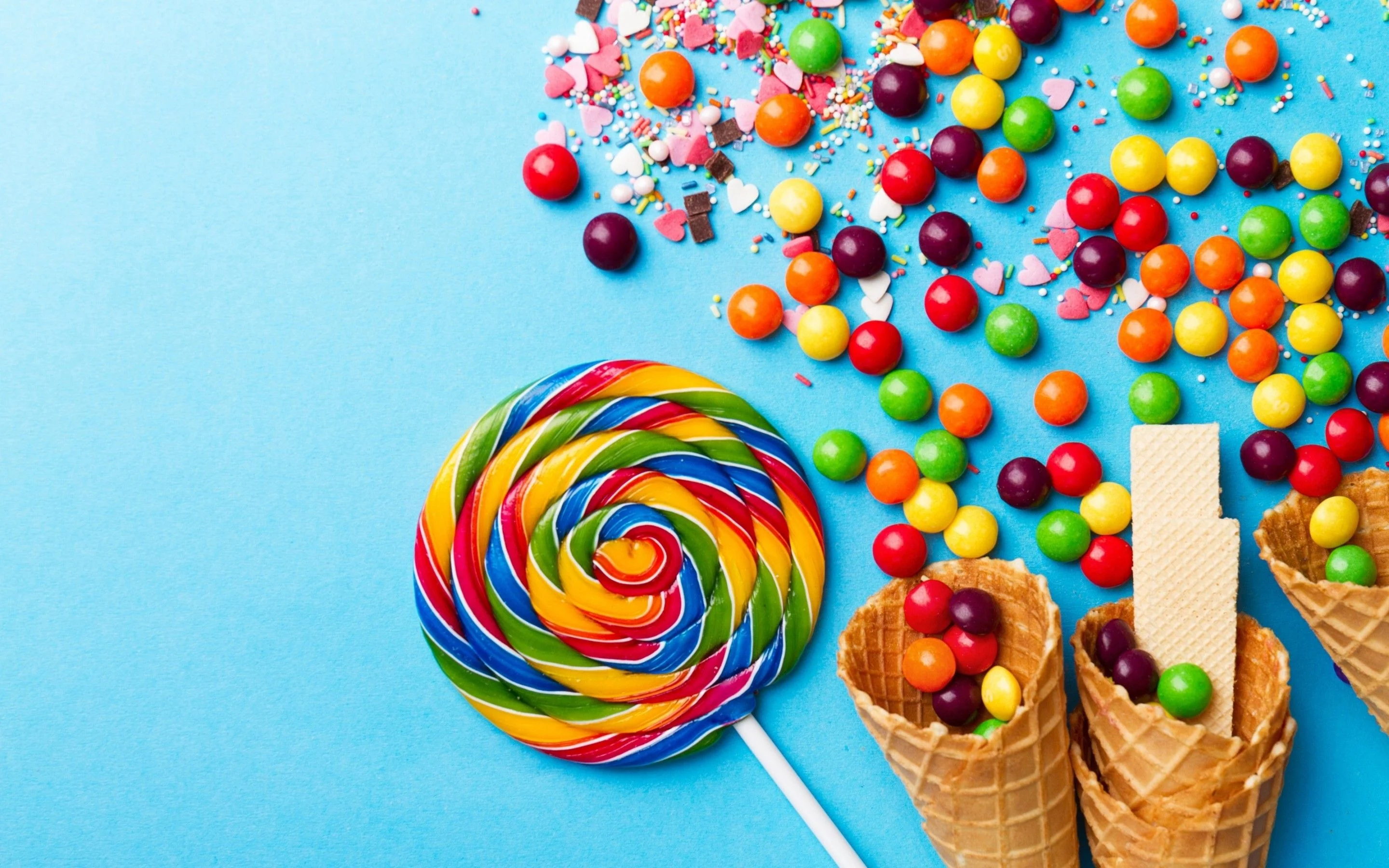 Candy-themed laptop wallpaper, Playful and colorful, Sweet indulgence, Eye-catching design, 2880x1800 HD Desktop