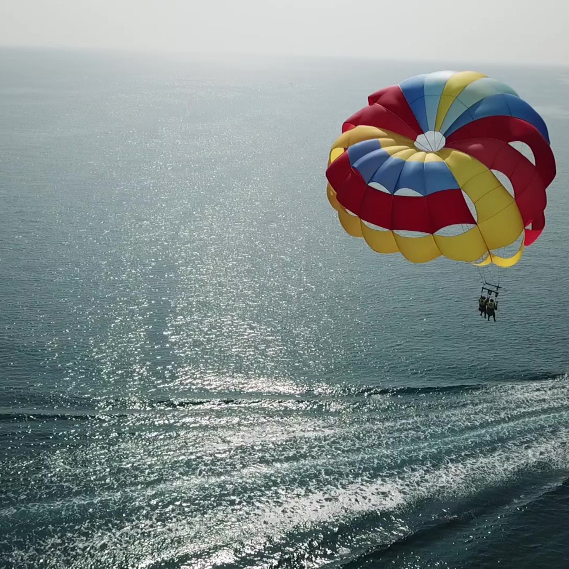 Parasailing: Several hundred feet away from the ground, The breathtaking view down below, Amusements. 1920x1920 HD Wallpaper.