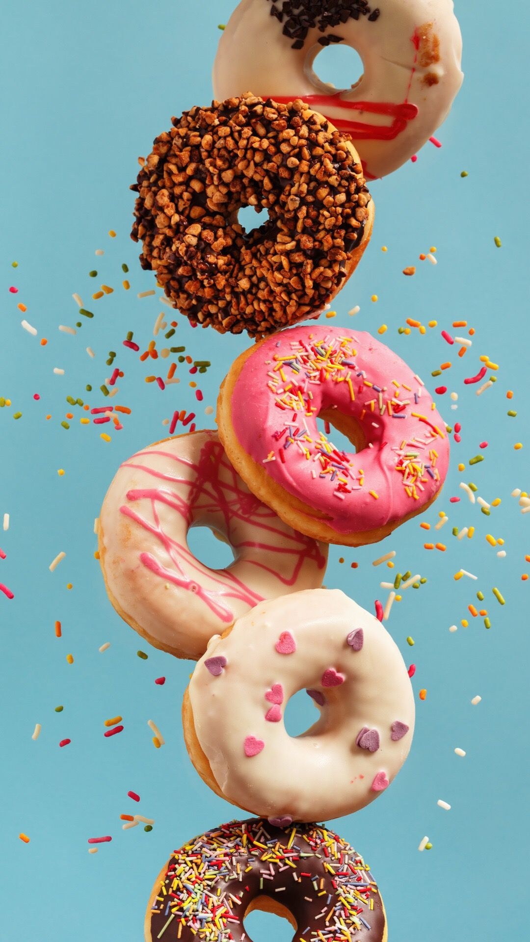Donut: Known for their porous structures and melt-in-your-mouth consistencies. 1080x1920 Full HD Wallpaper.
