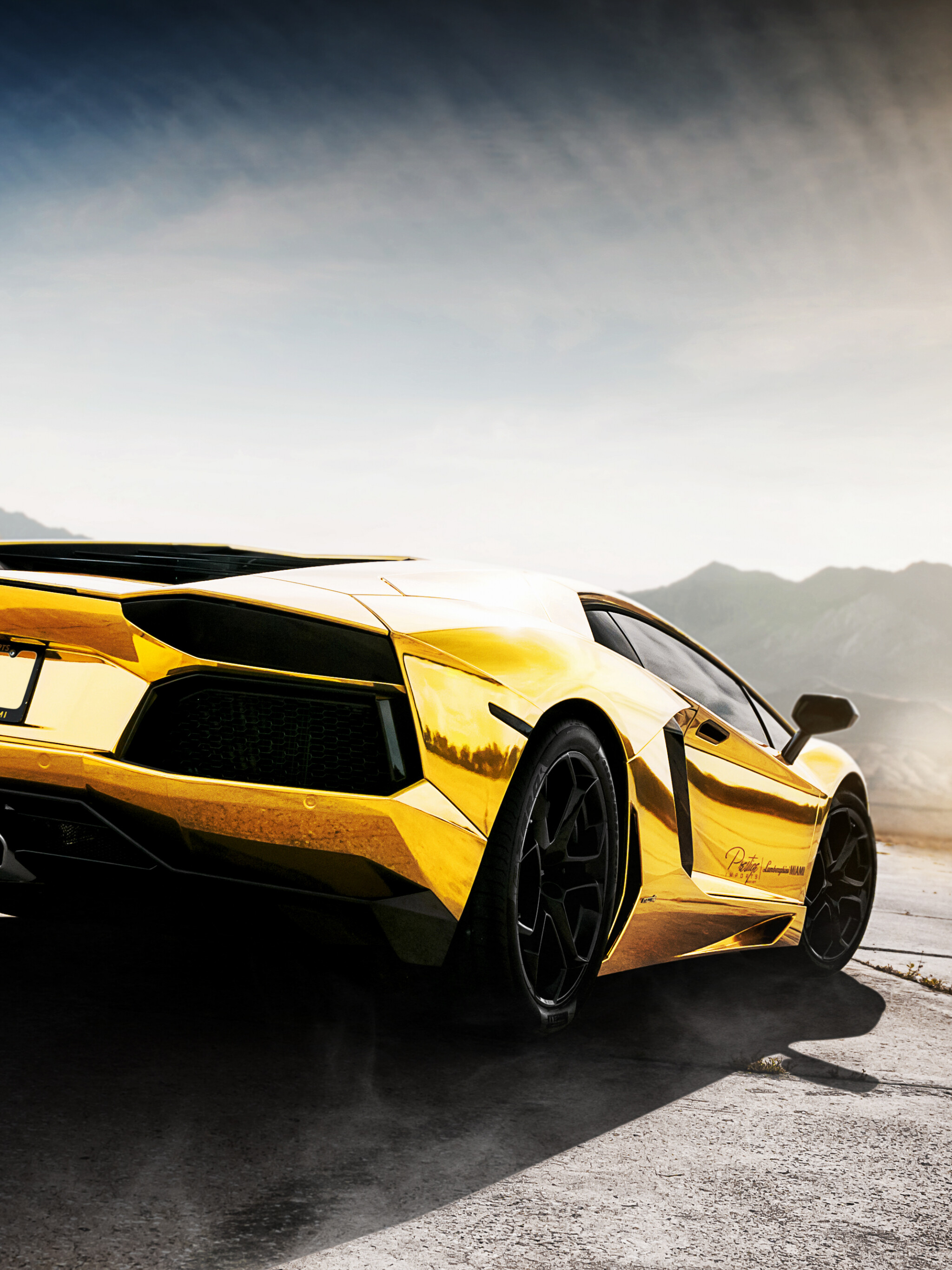 Gold Lamborghini: Aventador, A mid-engine sports car named after a Spanish fighting bull that fought in Zaragoza. 2050x2740 HD Wallpaper.