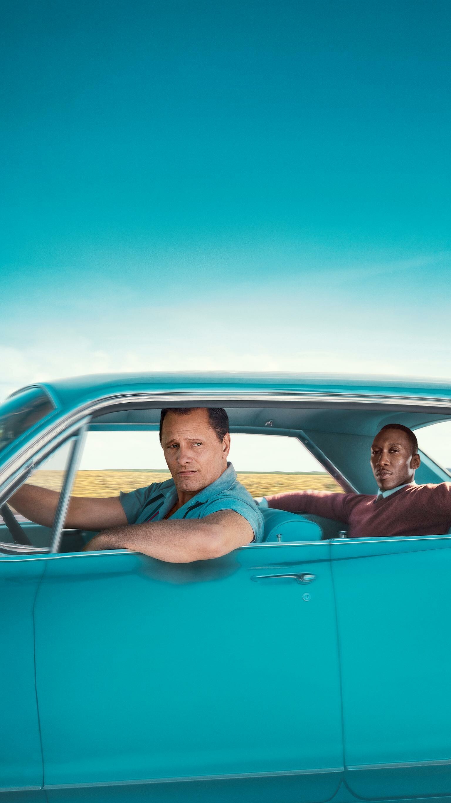 Green Book: An African-American pianist in need of a driver for his eight-week concert tour through the Midwest and Deep South. 1540x2740 HD Background.