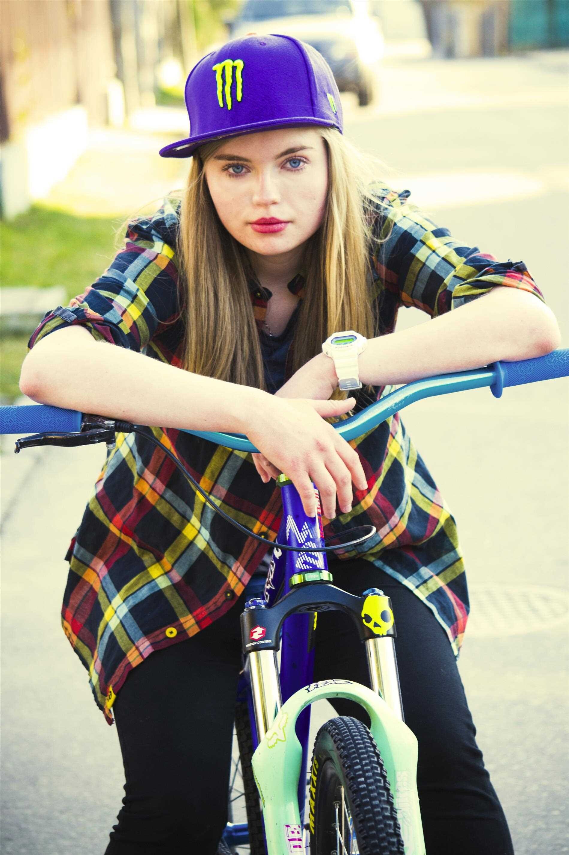 Girl and Bike: A teenager riding a bicycle, Street bike, Stylish checkered shirt. 1900x2860 HD Background.