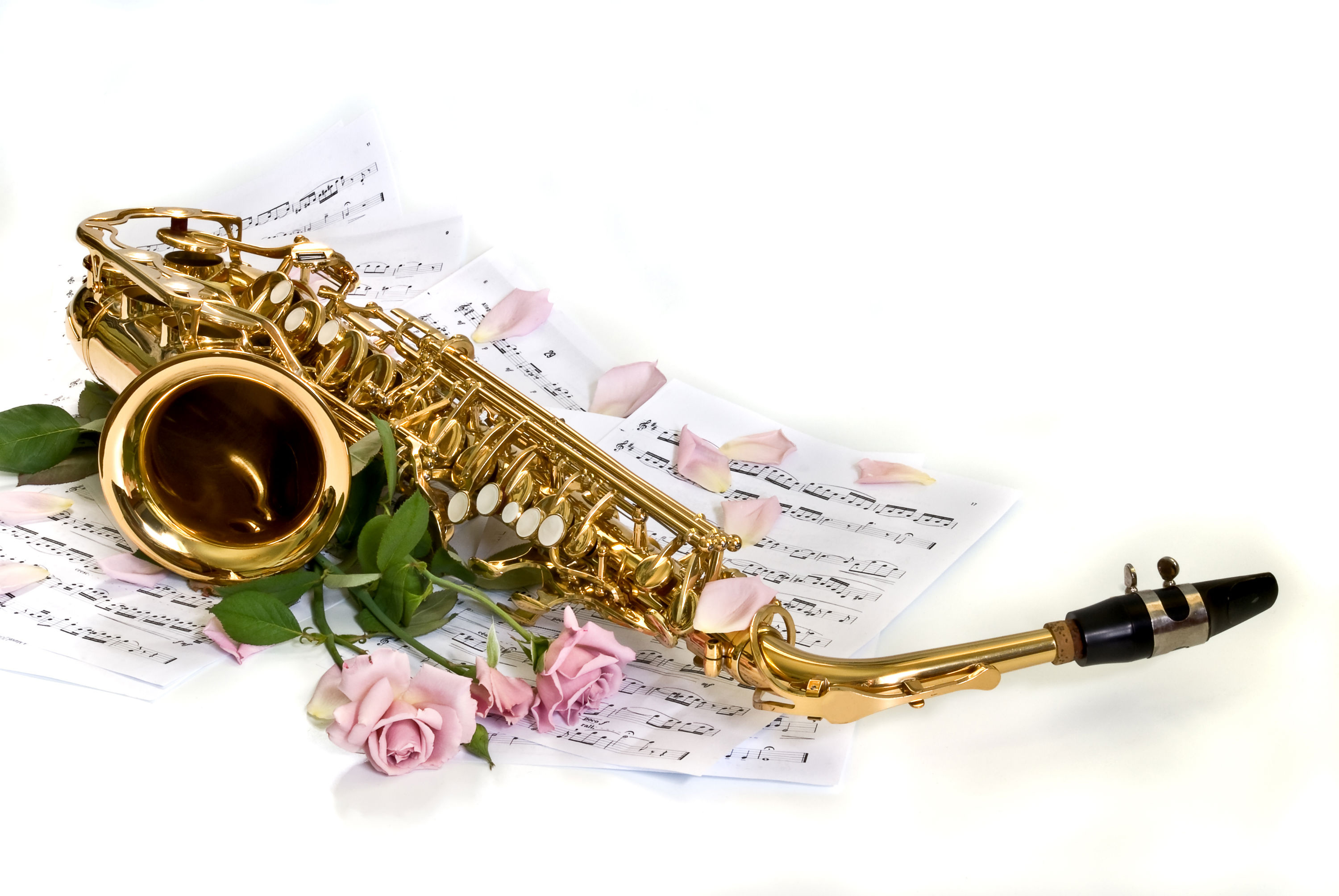 Saxophone: A musical wind instrument consisting of a brass tube and a mouthpiece with one reed. 3000x2010 HD Background.