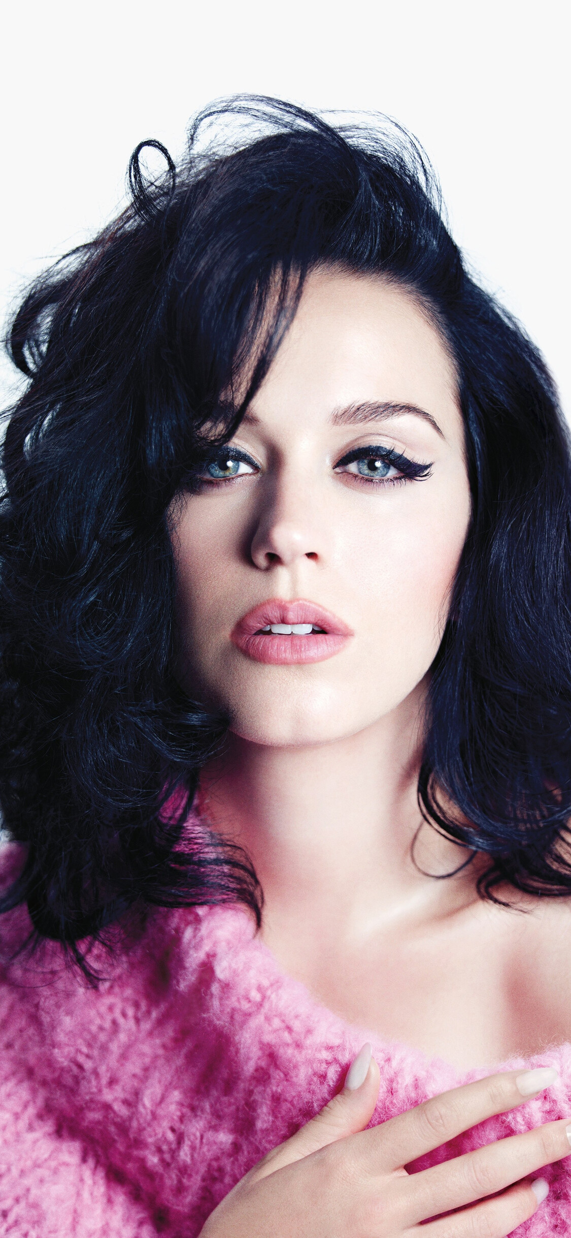 Katy Perry: The first artist to have multiple videos reach one billion views on Vevo. 1130x2440 HD Background.