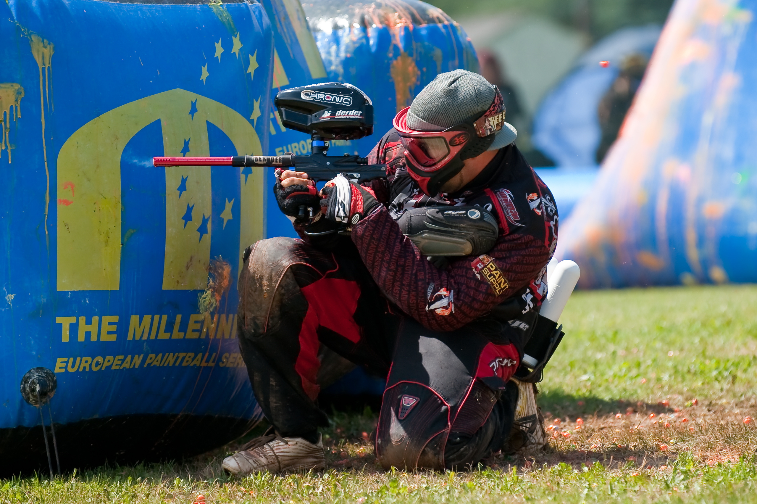 Paintball: A competitive team shooting sport in which players eliminate opponents from play by shooting them with markers. 2560x1710 HD Wallpaper.