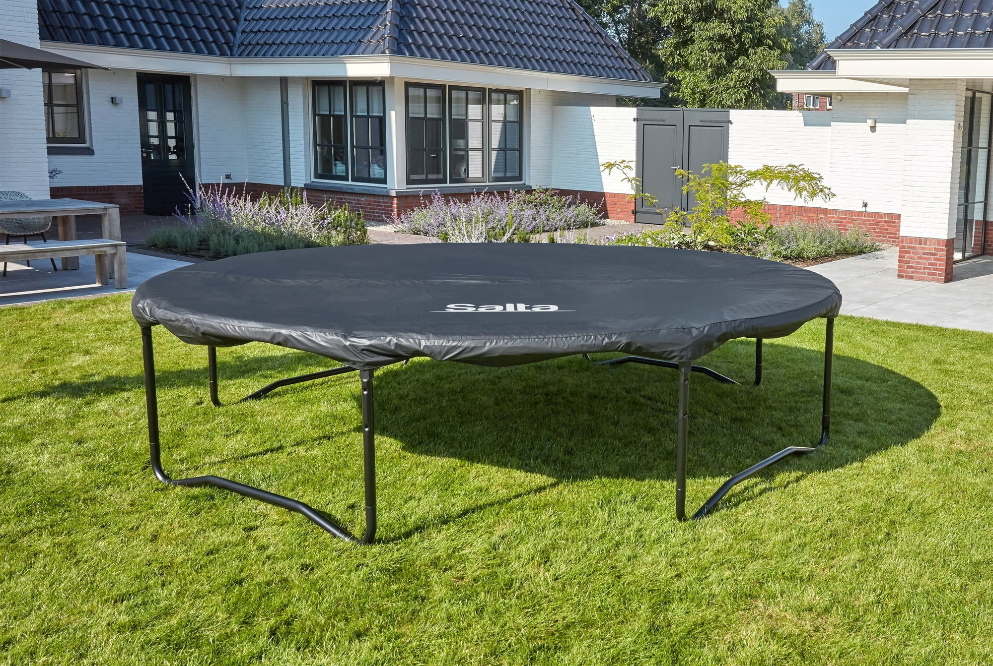Trampolining: A backyard trampolined by Salta, A small but useful acrobatics apparatus for a recreational sport. 2000x1350 HD Background.