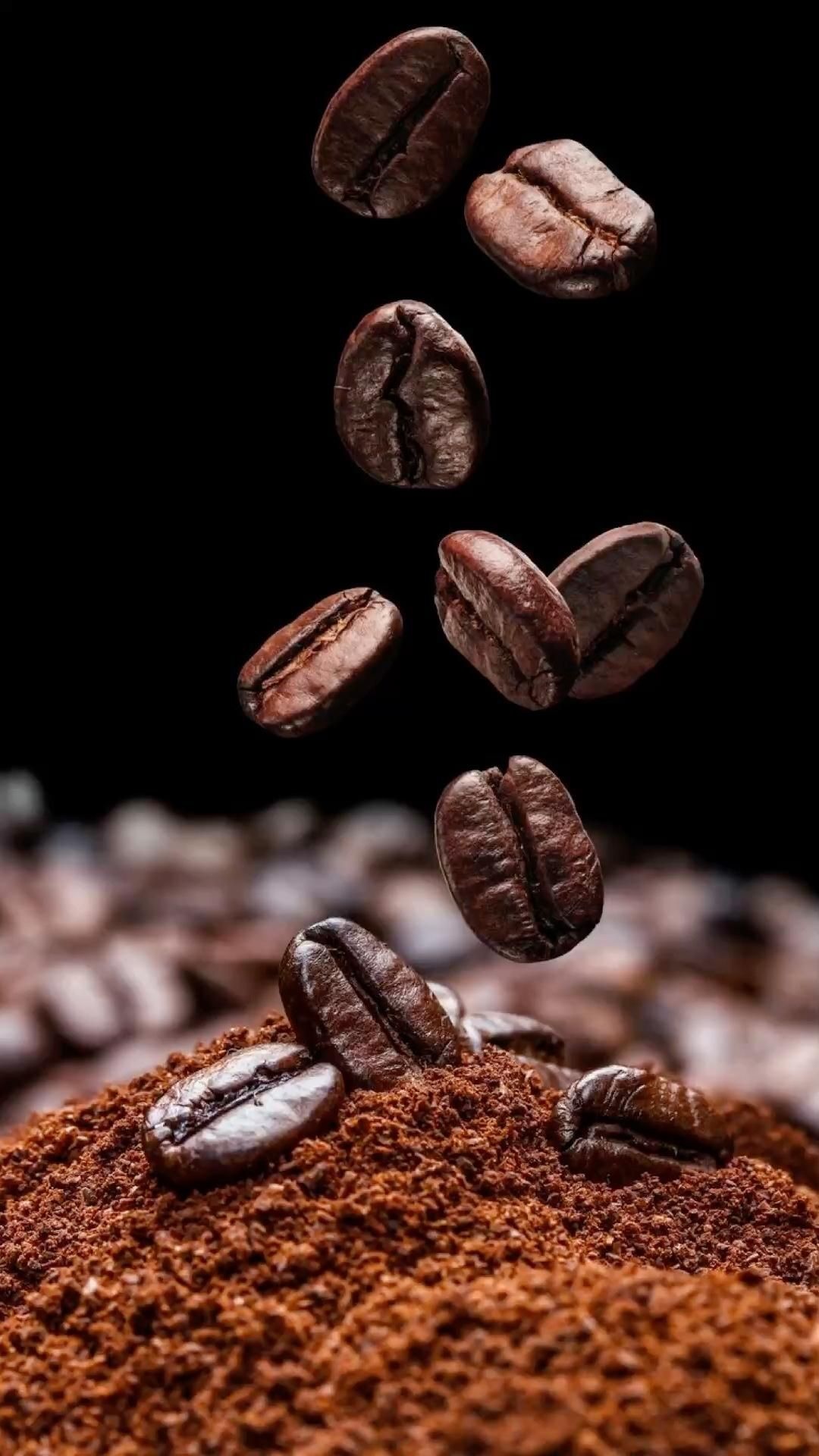 Coffee: The seedlings of a red or purple fruit, similar to that of a cherry. 1080x1920 Full HD Background.