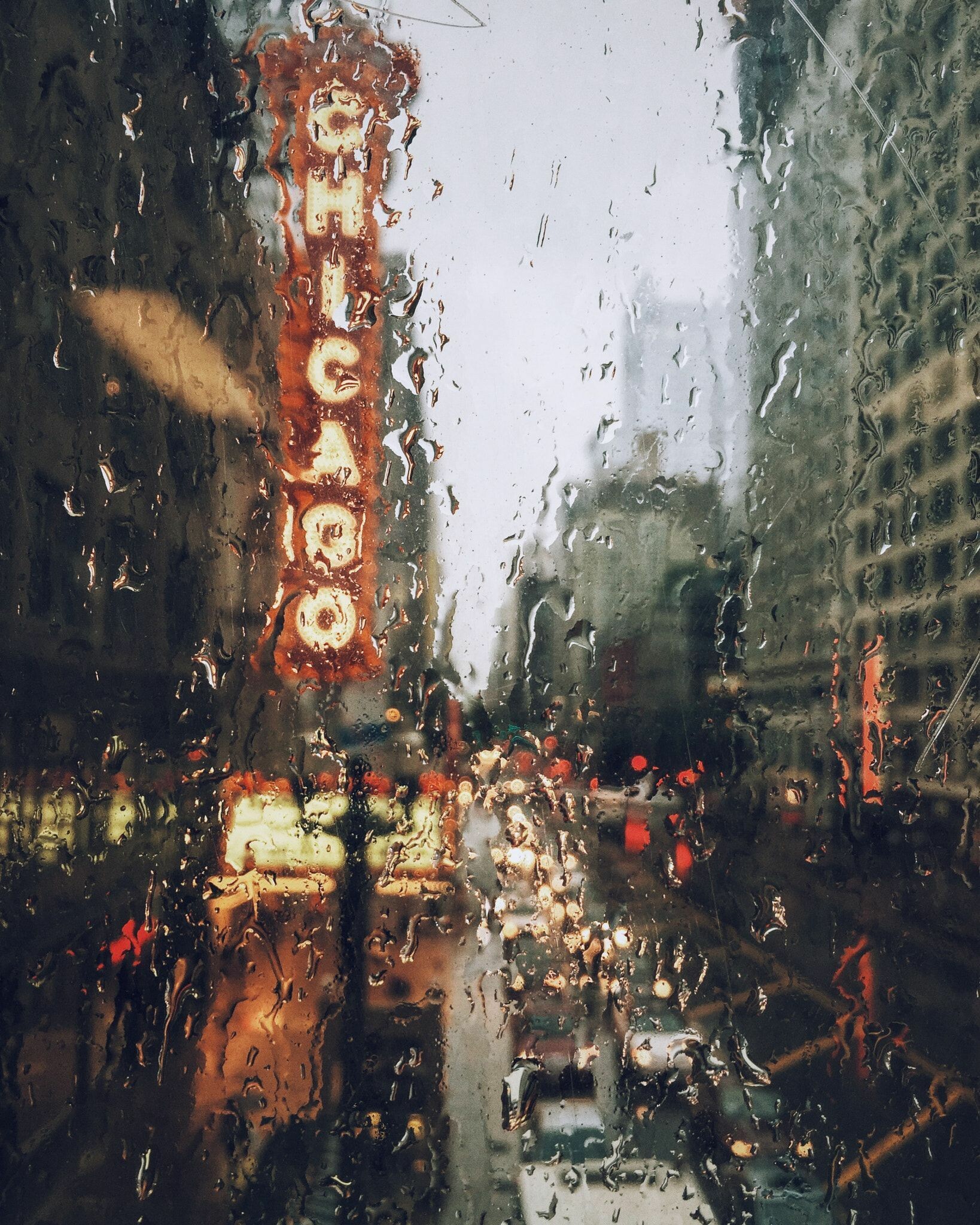 Rain: Chicago, Droplets contain dissolved nitrogen that comes from the air. 1640x2050 HD Background.