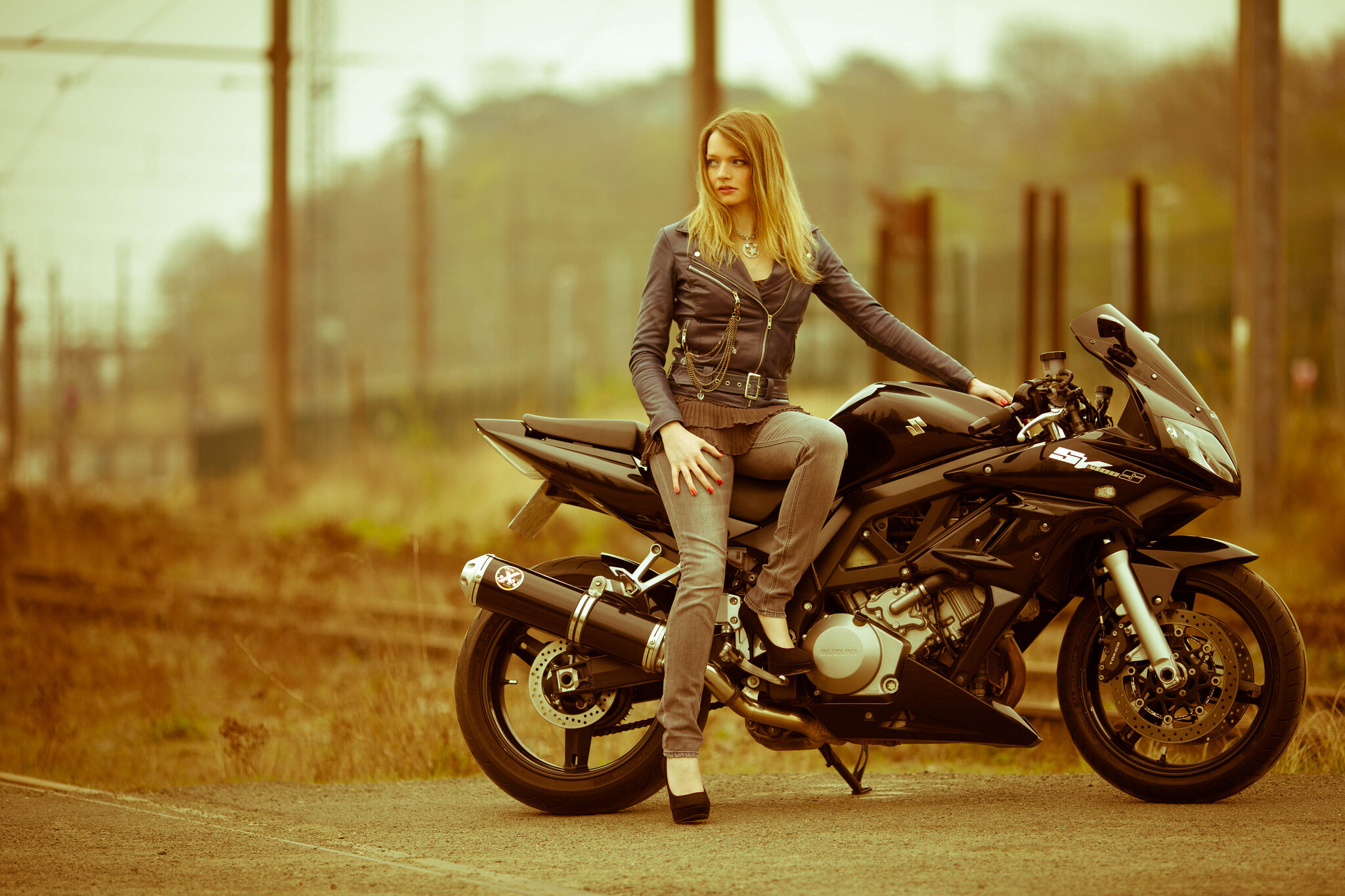 Girls and Motorcycles: Suzuki, A manufacturer of motorcycles since 1952, Street bike, Mid-sized V-twin engine. 2050x1370 HD Background.