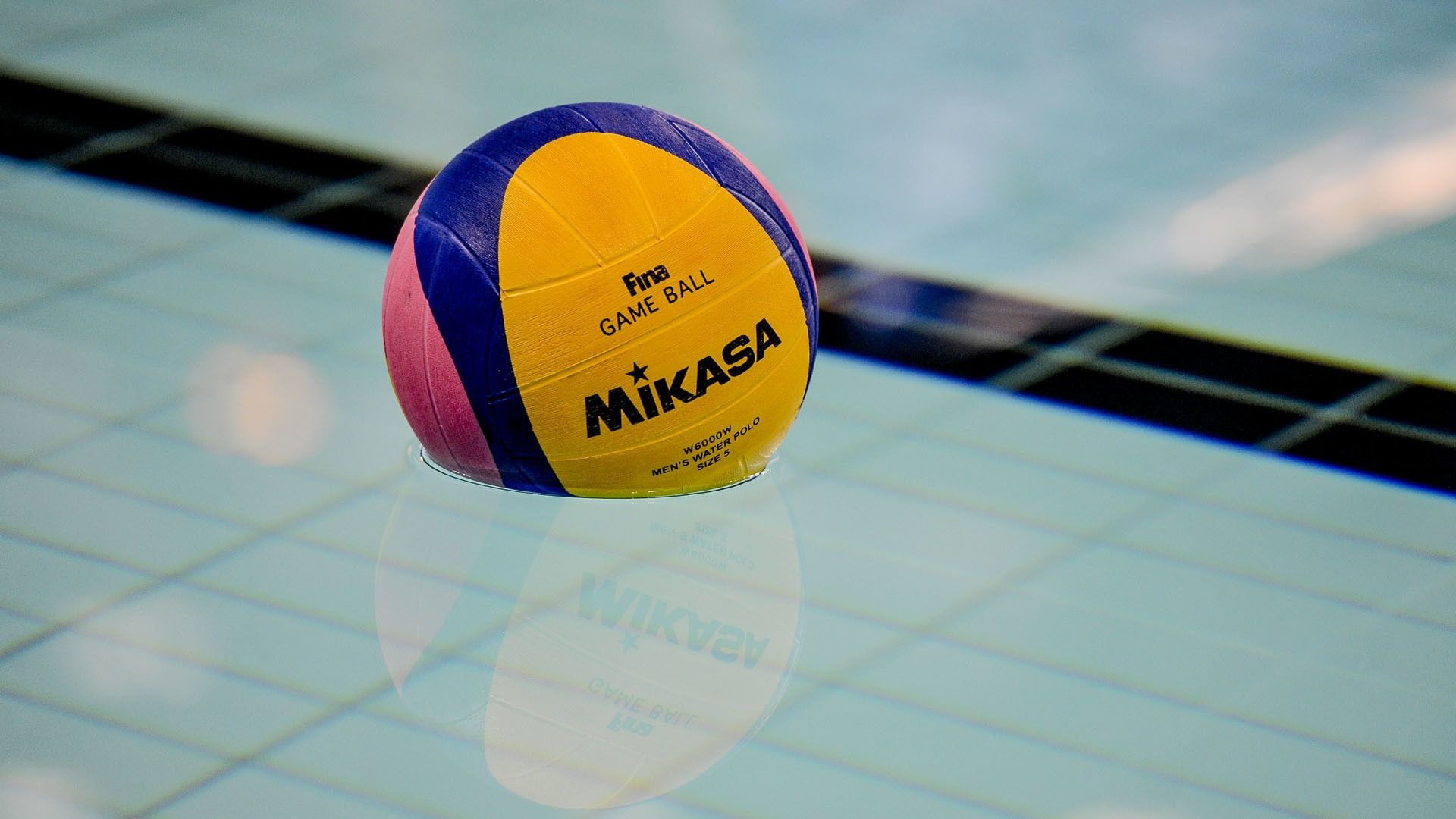 Water Polo: A standard swim sports disciplines ball approved by the International Swimming Federation. 1920x1080 Full HD Background.