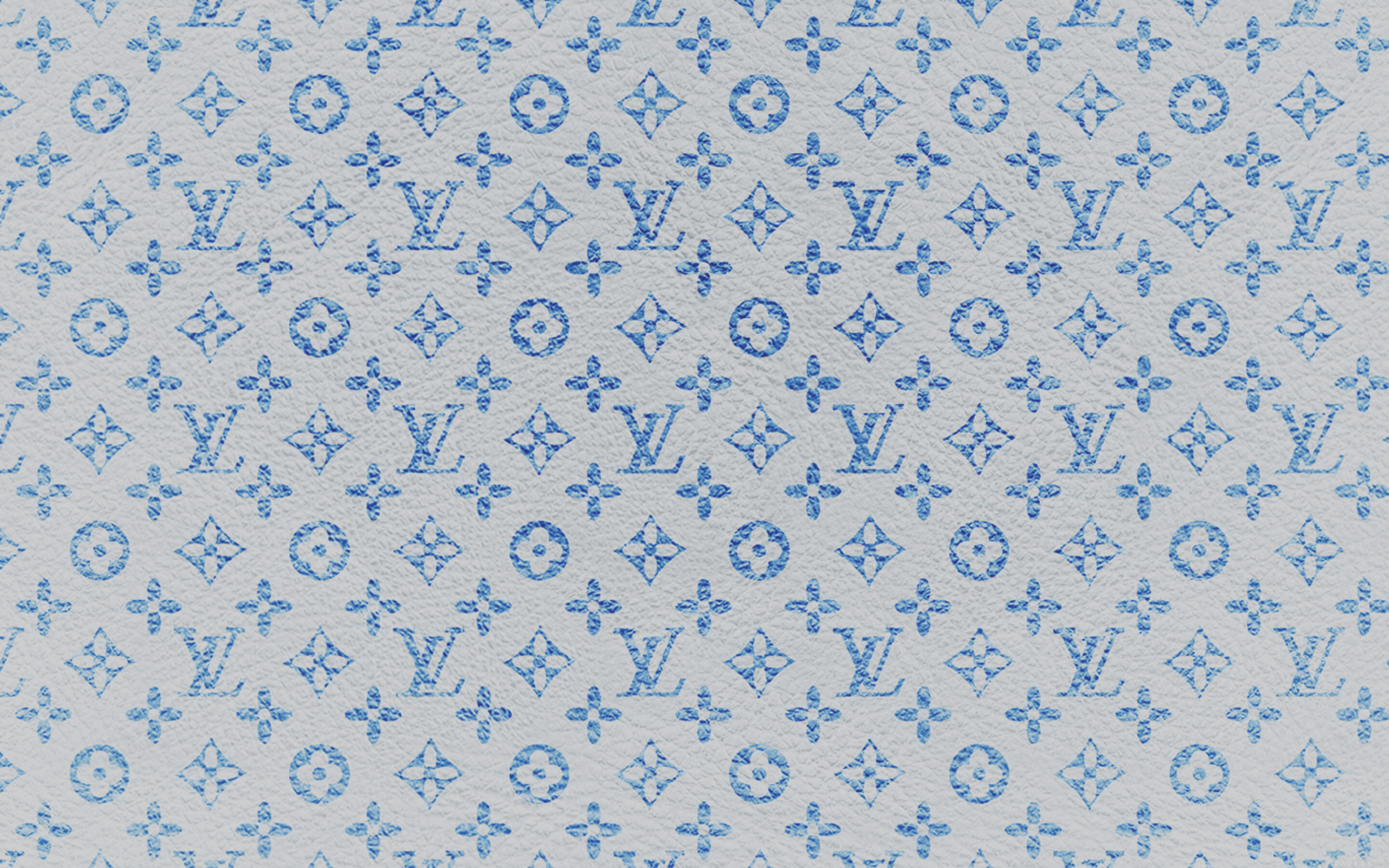 Louis Vuitton: Leather products, such as handbags, luggage, and accessories. 2880x1800 HD Background.