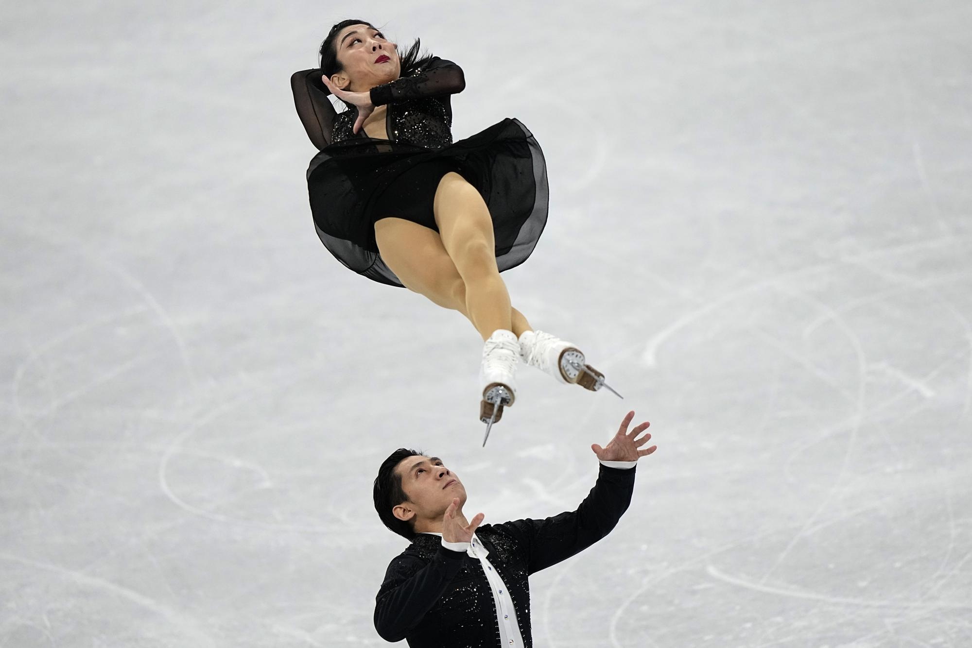 Pair Skating: Sui Wenjing and Han Cong, The pairs short program, 2022 Beijing Winter Olympics. 2000x1340 HD Background.