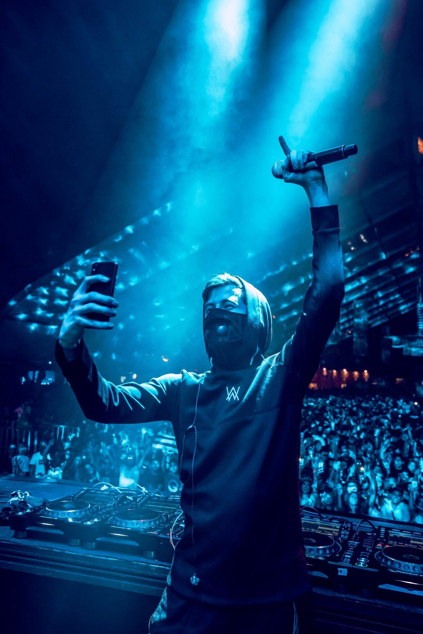 Alan Walker: A famous DJ, performing all over the world, Tomorrowland, Coachella. 1370x2050 HD Wallpaper.