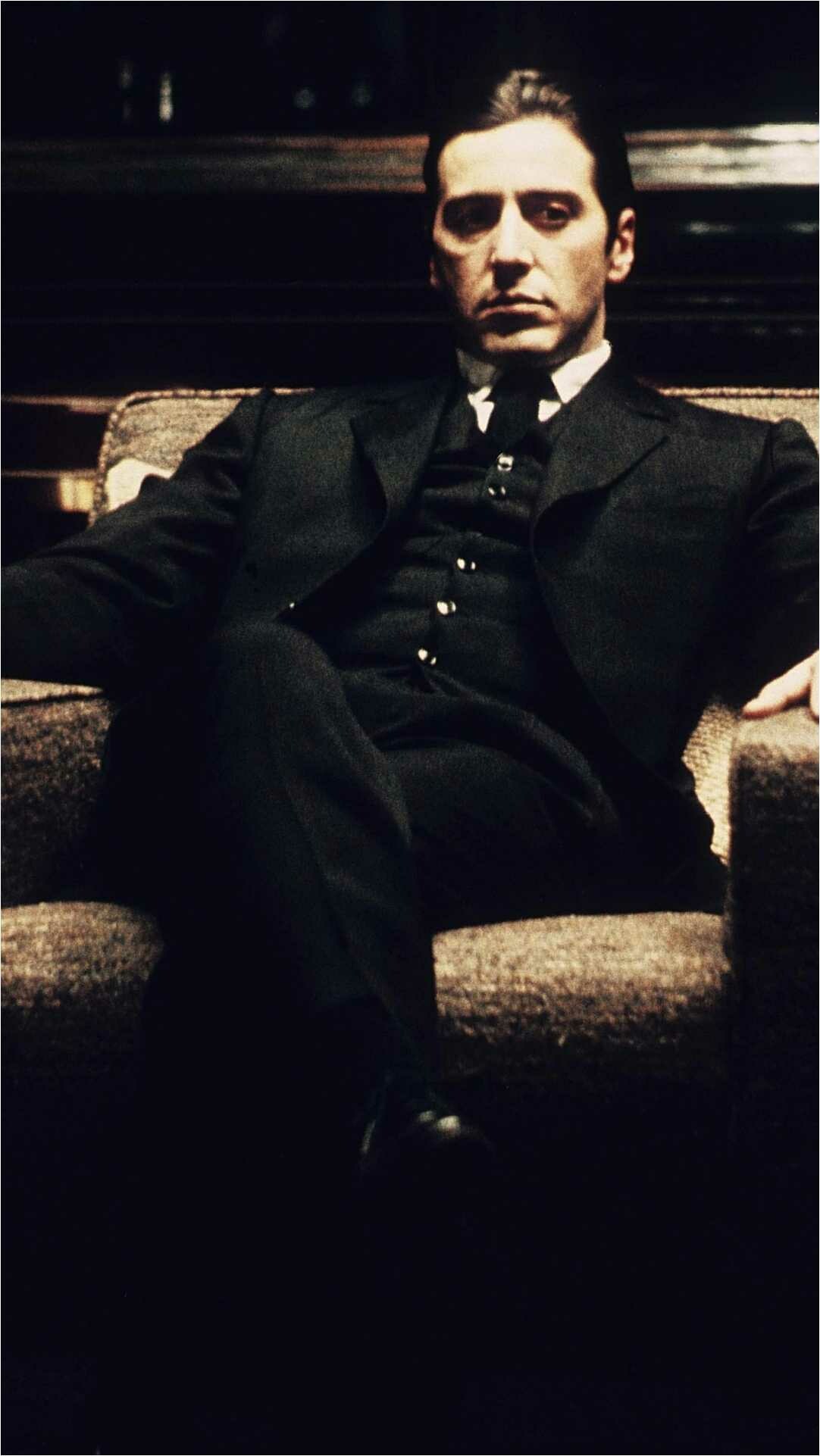 The Godfather: The film focuses on the transformation of Michael Corleone from reluctant family outsider to ruthless mafia boss. 1090x1930 HD Background.