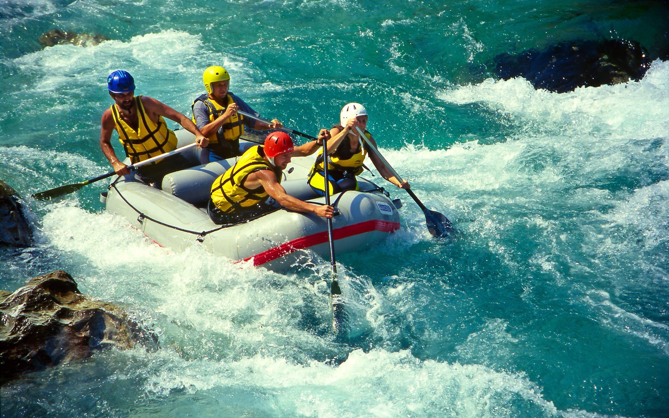 Rafting: Active maneuvering skills performed by professionals, Class 4 whitewater difficulty. 2560x1600 HD Wallpaper.