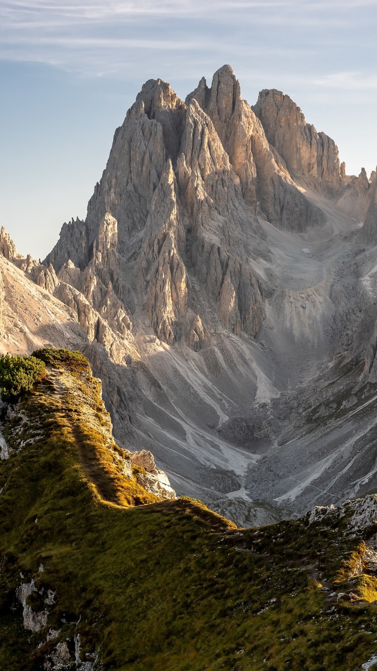Geology: Dolomite Mountains in Italy, The Tre Cime di Lavaredo, Mountain range. 1440x2560 HD Background.