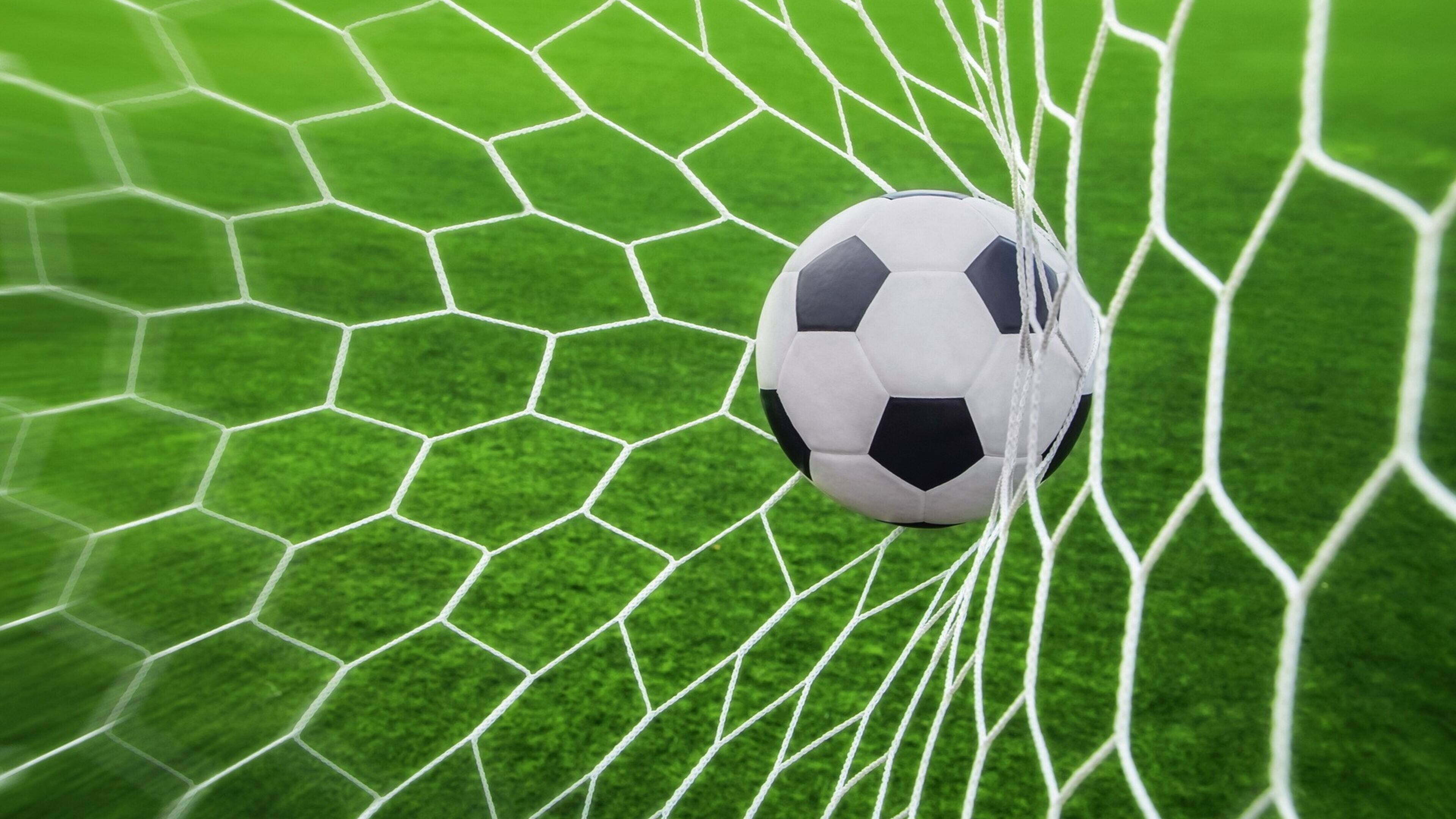 Goal (Sports): Football goal posts, Soccer net, Ball game, Black and white spherical truncated icosahedron pattern. 3840x2160 4K Wallpaper.