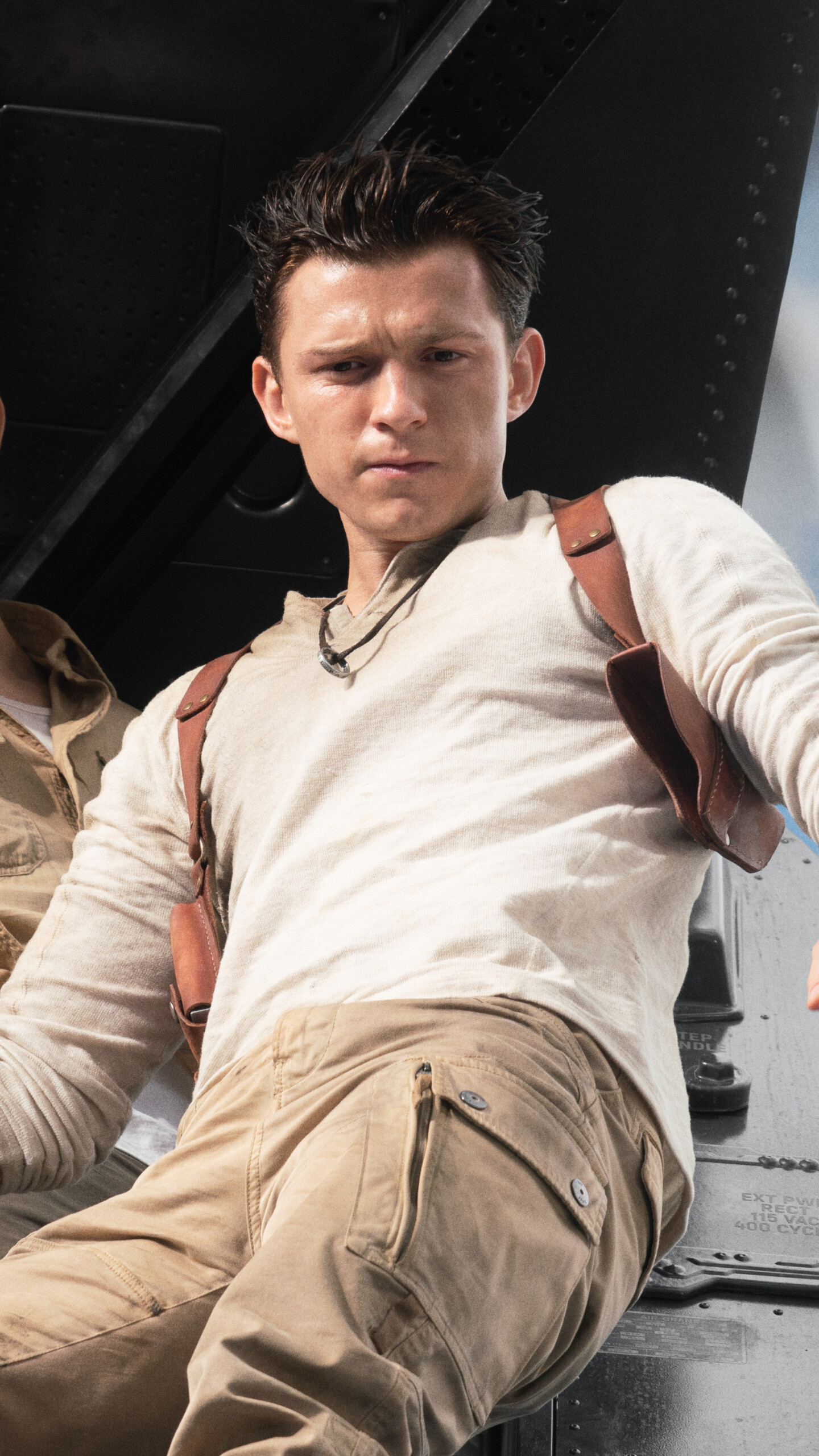Uncharted (Movie): Tom Holland as Nathan "Nate" Drake. 1440x2560 HD Background.