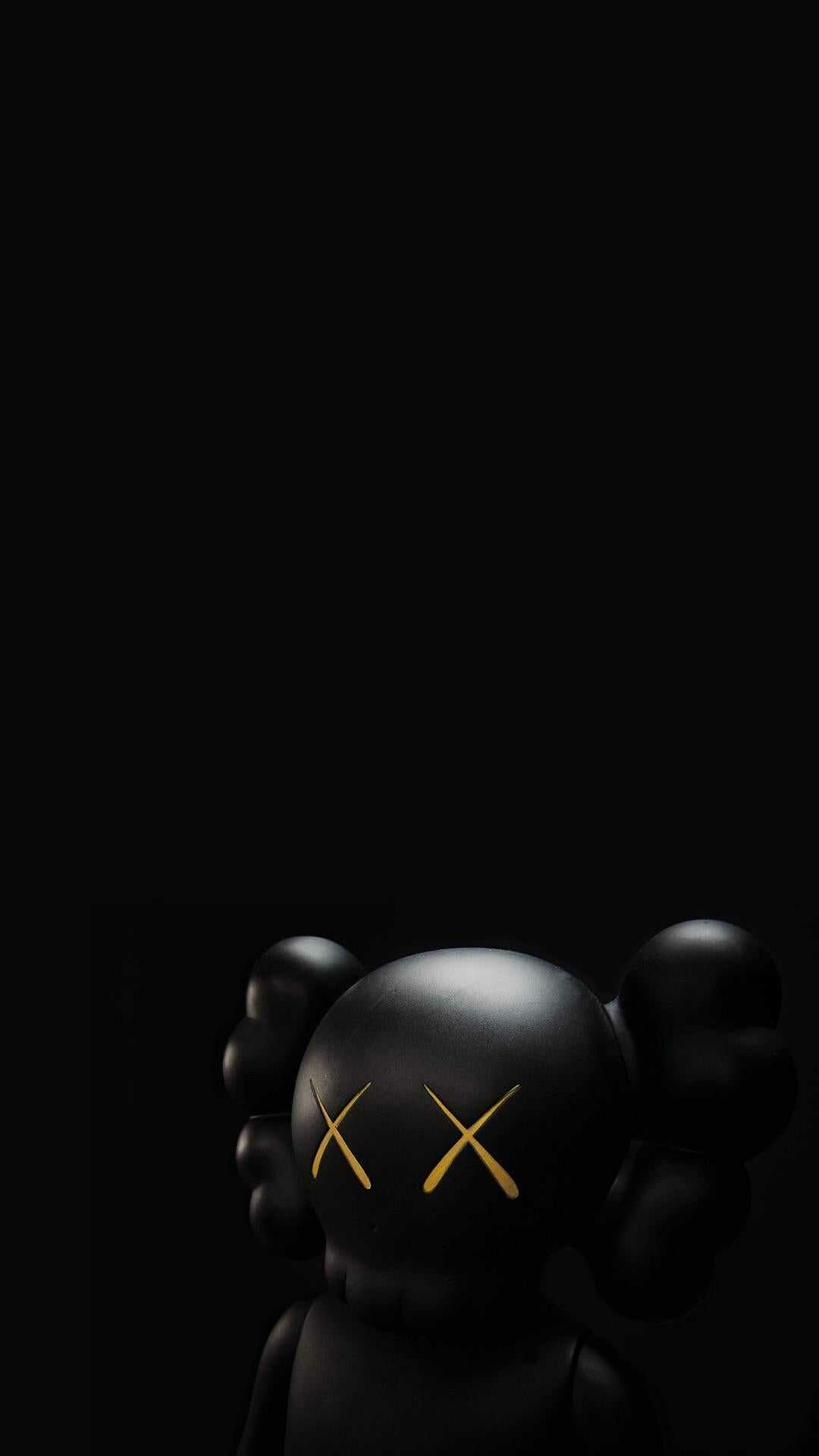 KAWS: Has collaborated with brands such as Disney, Marc Jacobs, and Comme des Garçons. 1080x1920 Full HD Background.